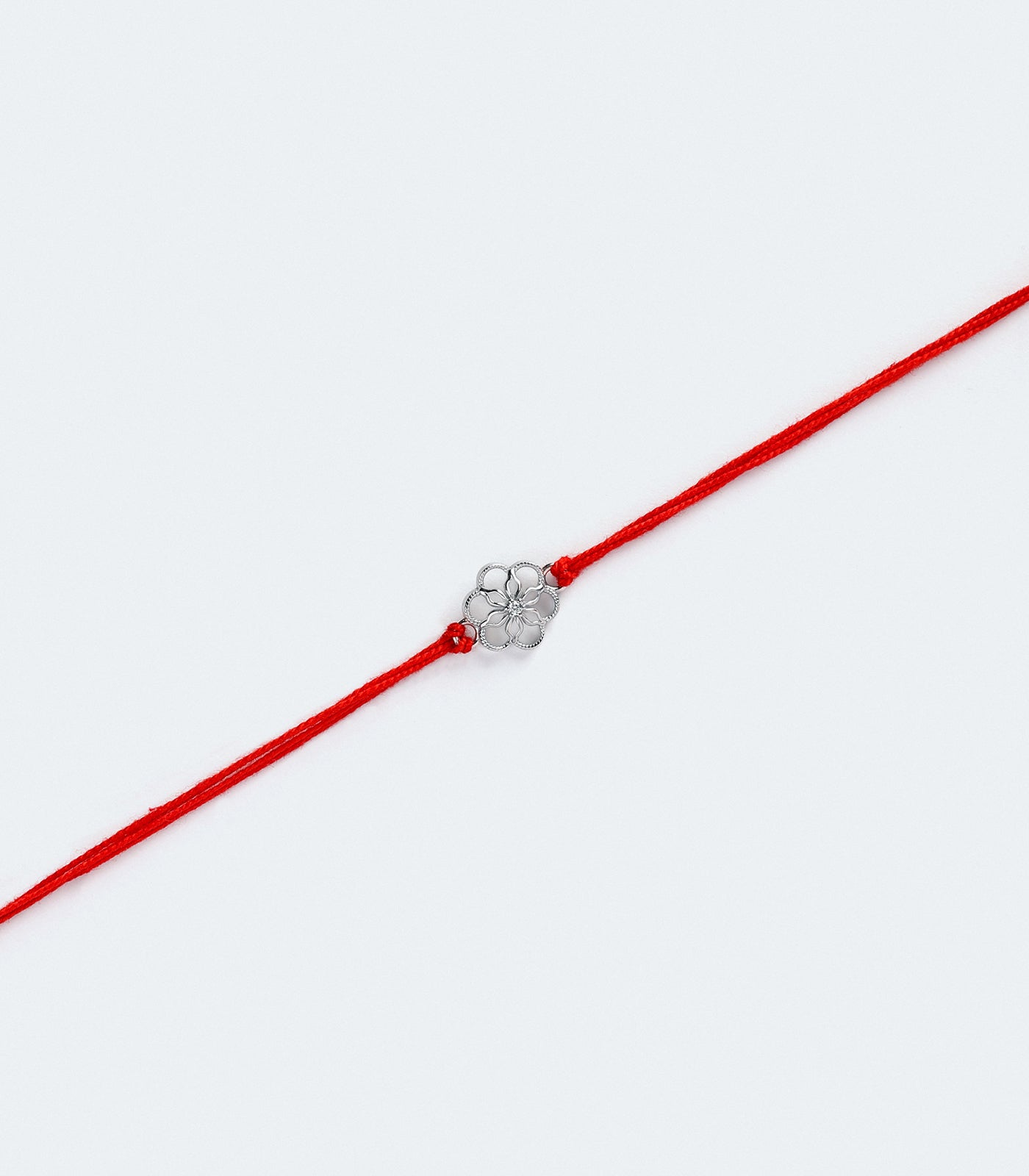 Floral Charm Silver Rakhi