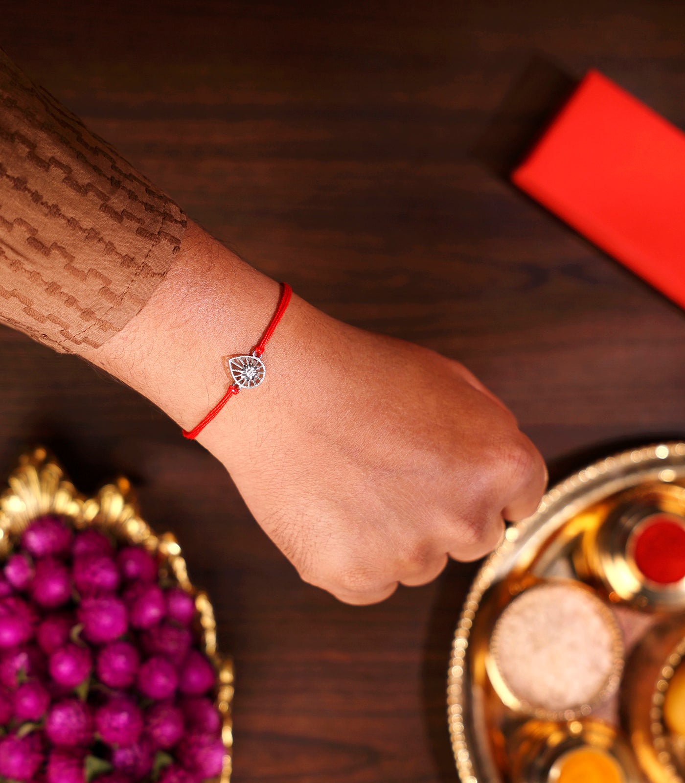 Drop Shaped Silver Rakhi