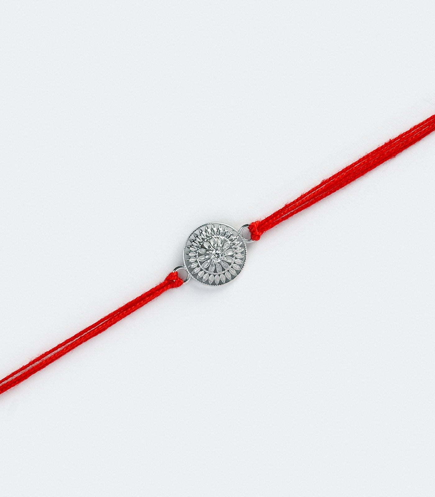Sacred Floral Silver Rakhi