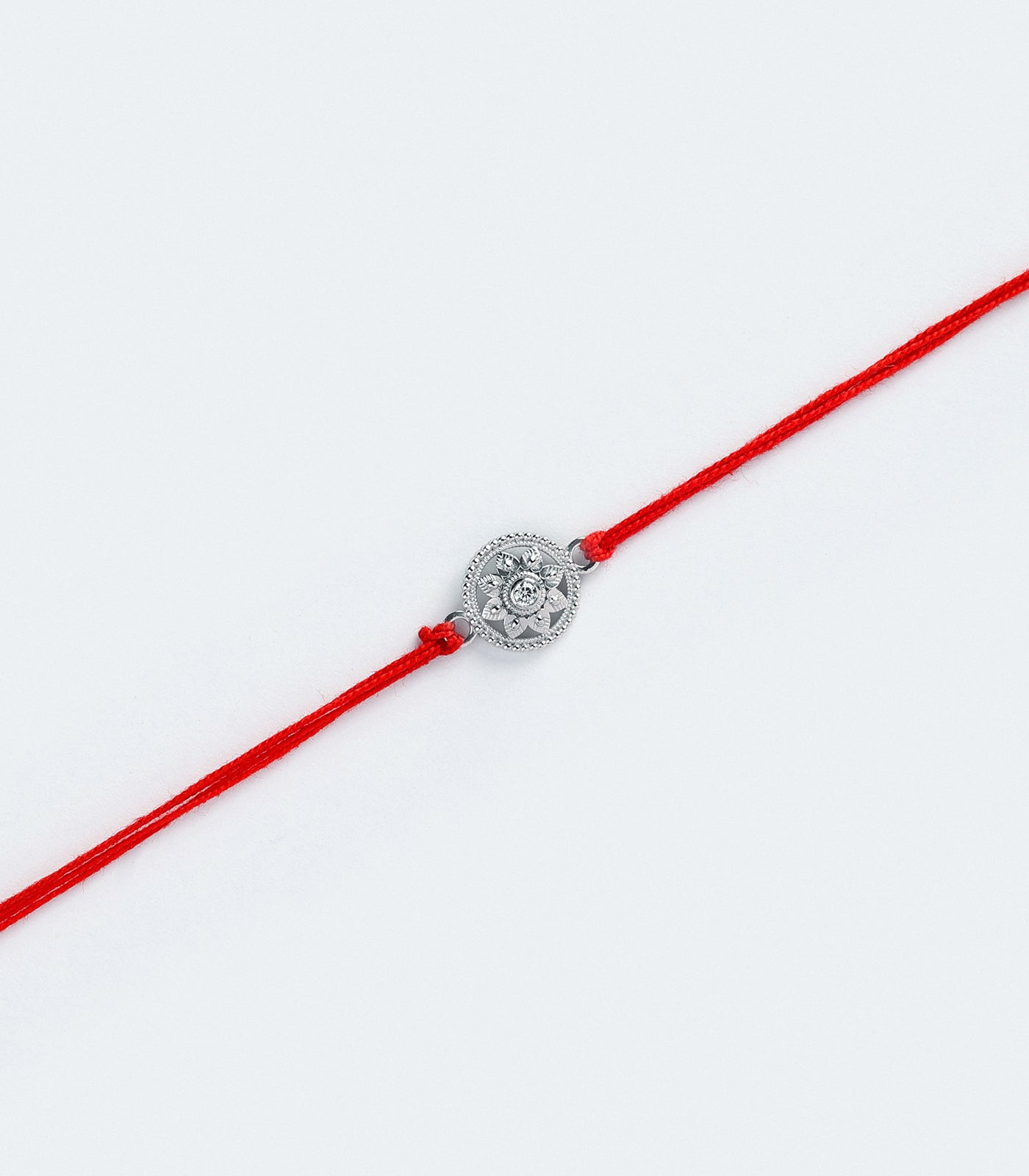 Ethreal Floral Motif Silver Rakhi
