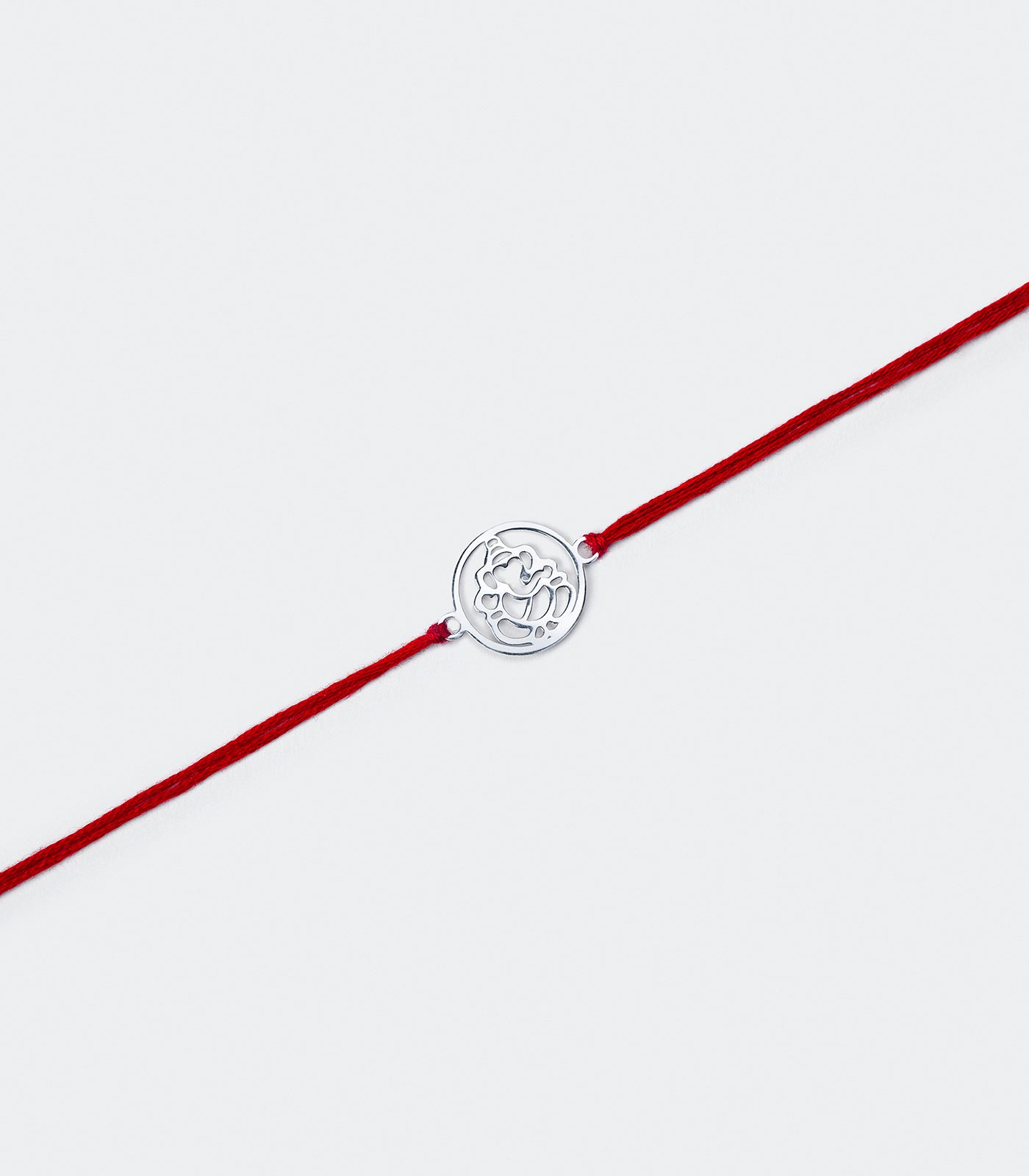 Gleaming Silver Rakhi - Divine Ganesh Design