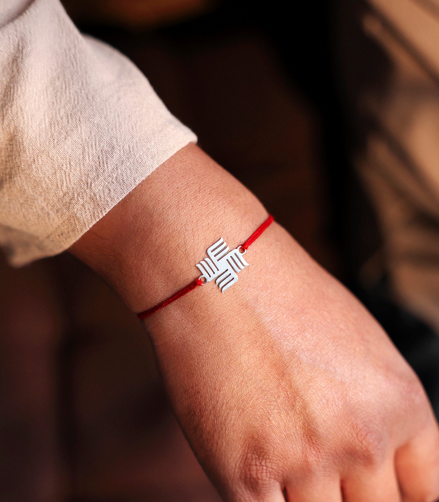 Radiant Silver Rakhi - Swastik Design