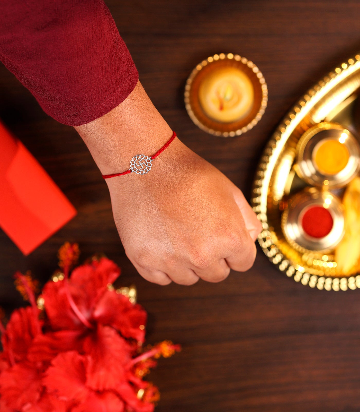 Elegant Silver Rakhi - Divine Swastik Design