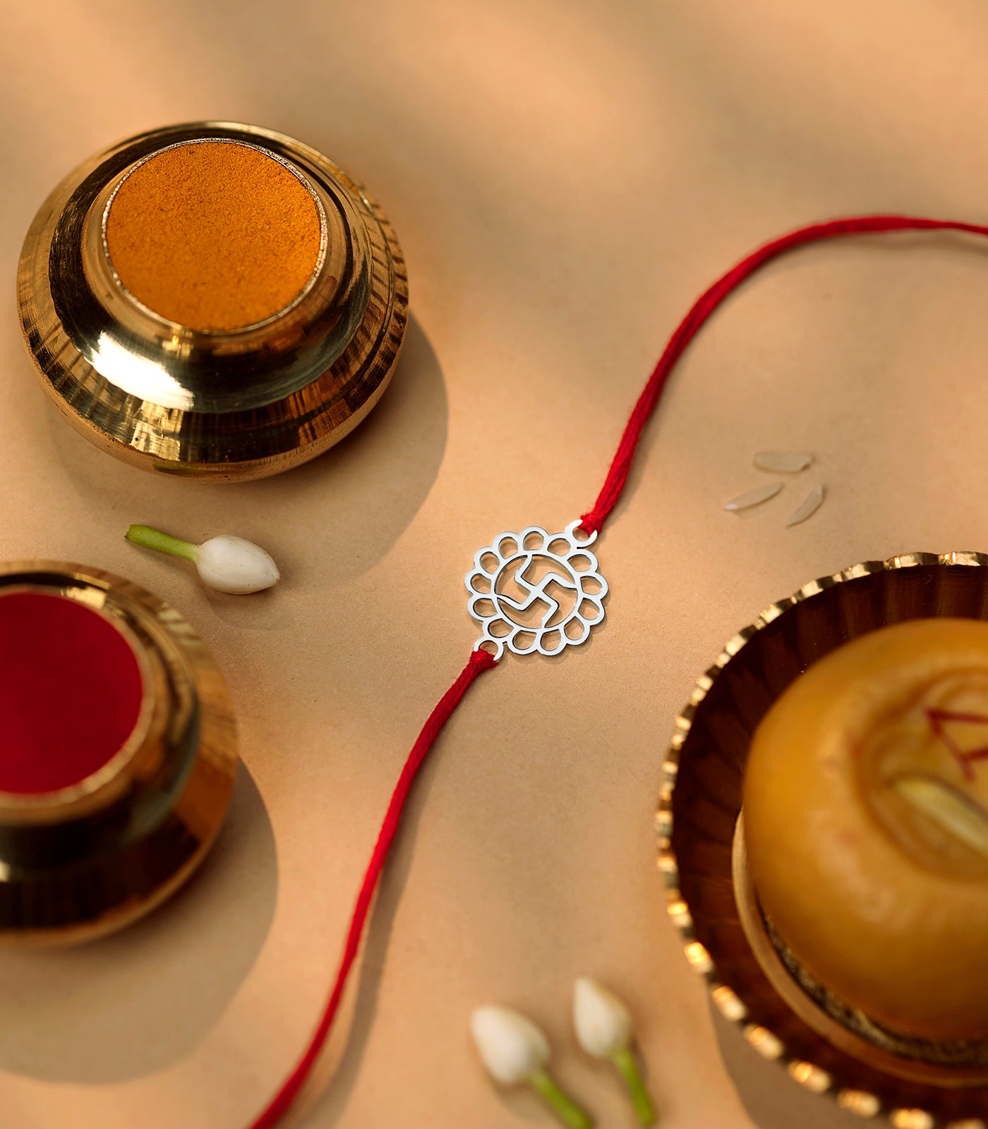 Elegant Silver Rakhi - Divine Swastik Design