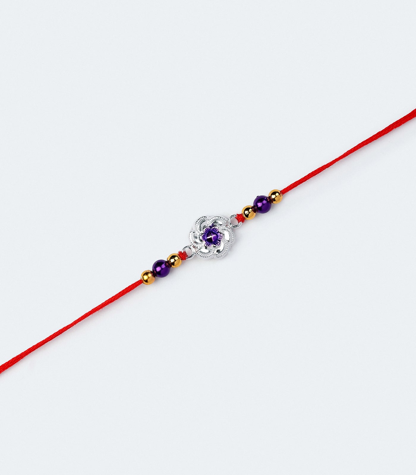 Silver Rakhi - Violet Floral Design