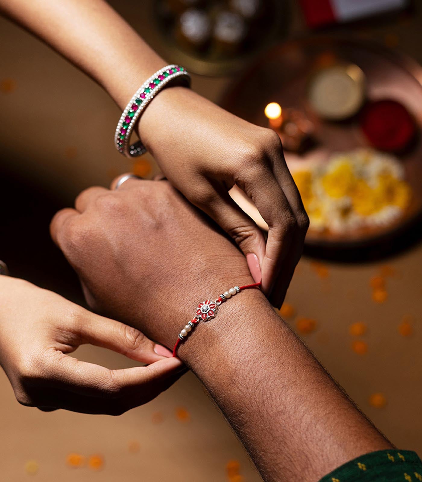 Beautiful Silver Rakhi - Red Petal Floral Design
