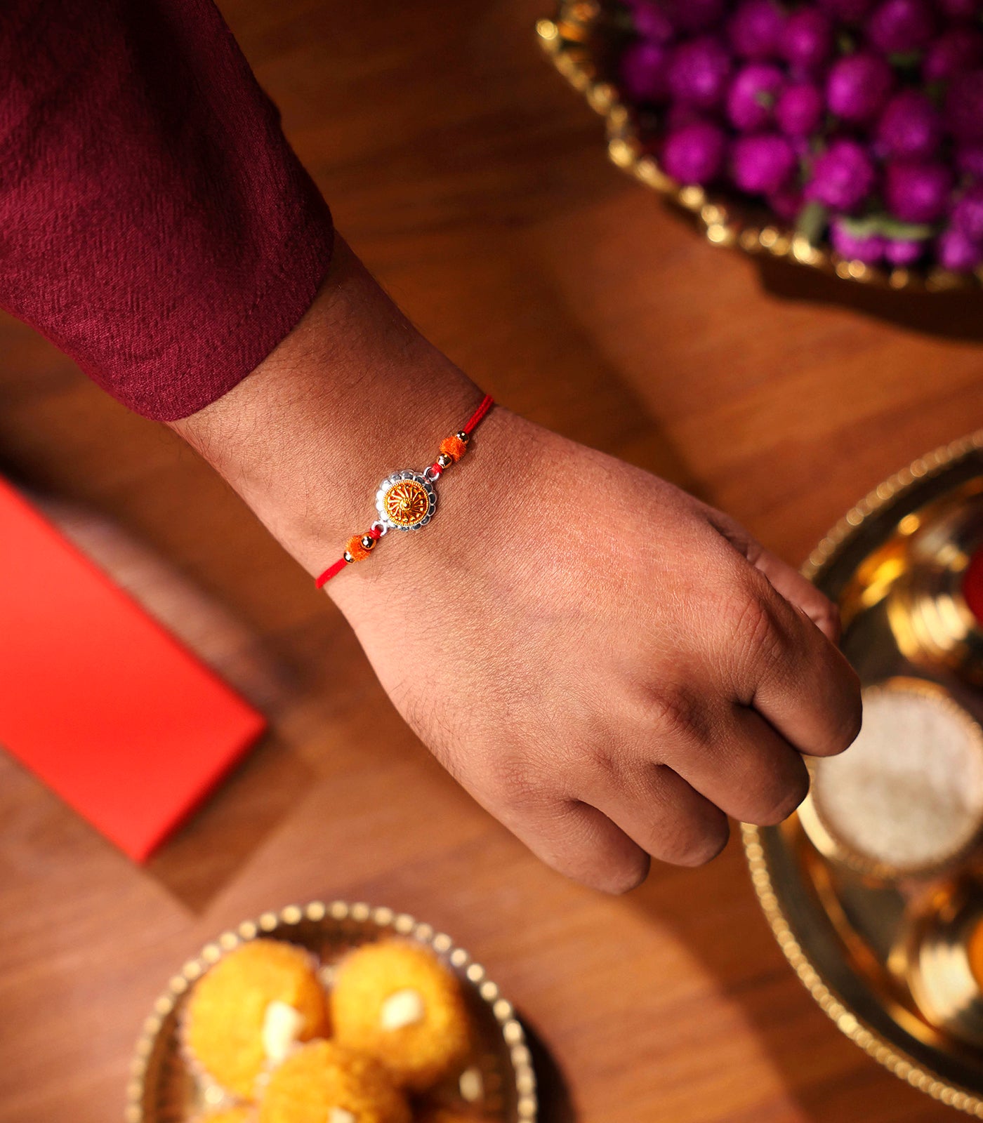 Beautiful Silver Rakhi - Golden Petals Design