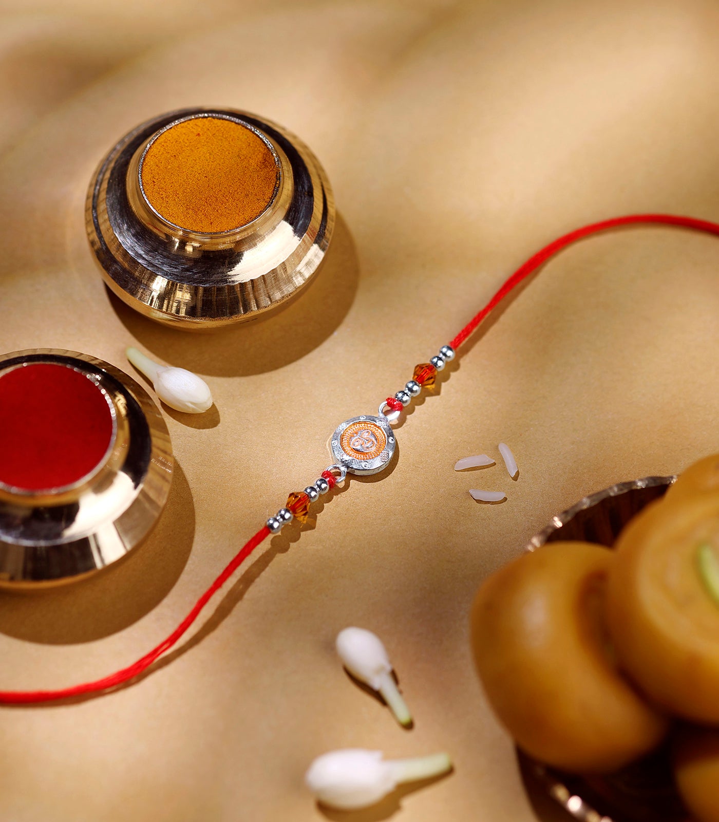 Charming Silver Rakhi - Heart of Sun Design