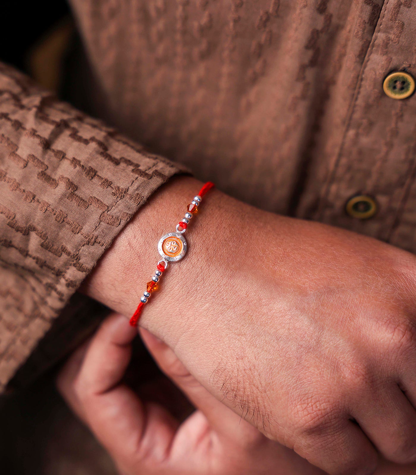 Charming Silver Rakhi - Heart of Sun Design