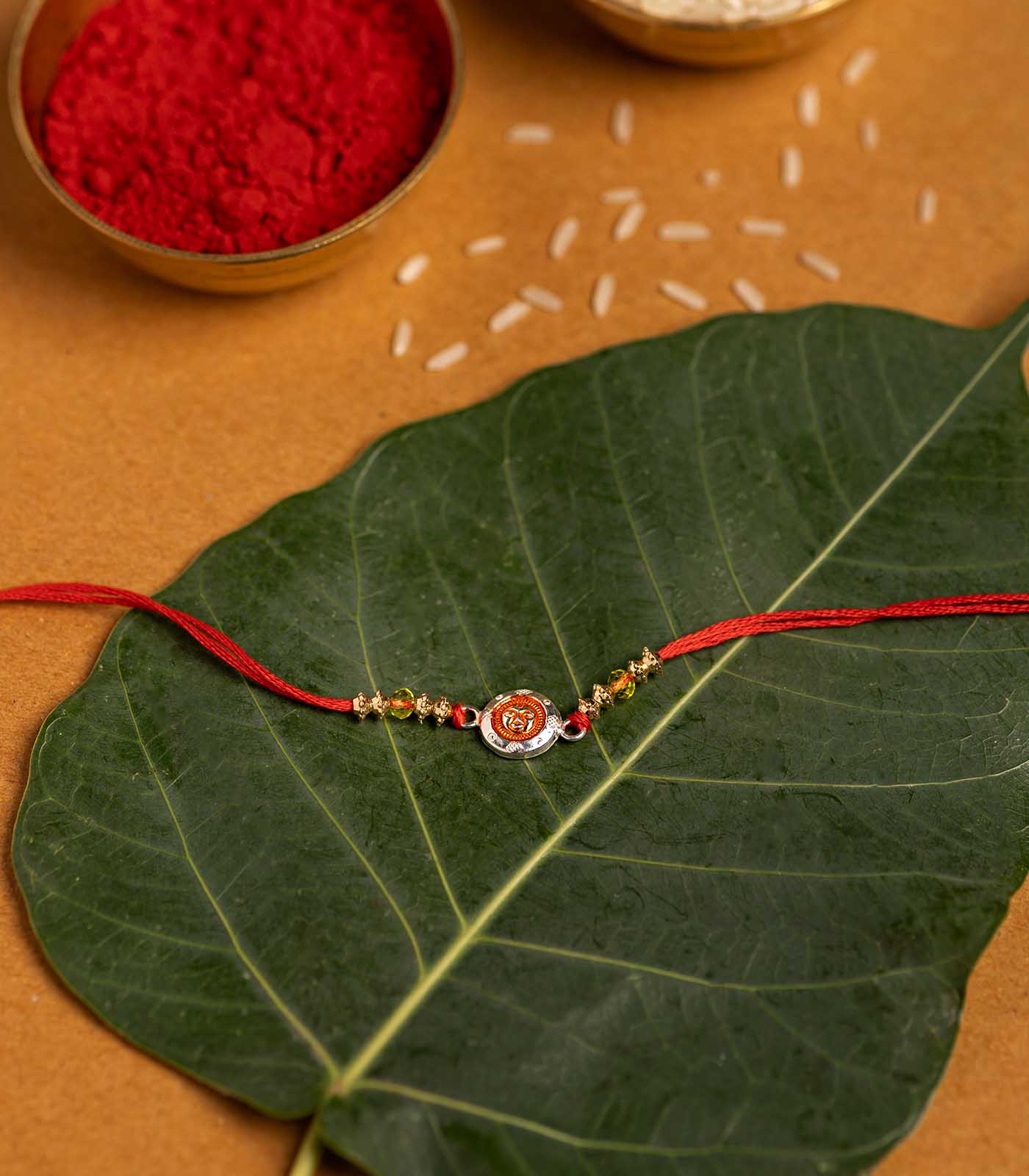 Charming Silver Rakhi - Heart of Sun Design