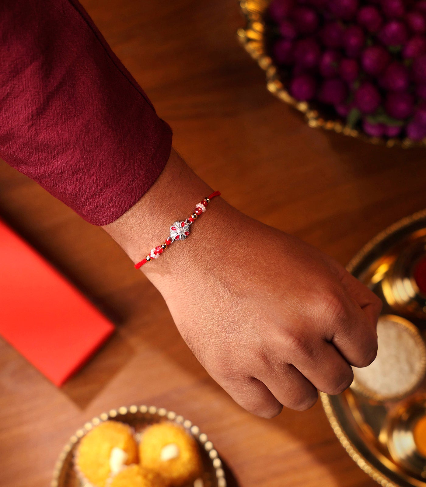 Stunning Silver Rakhi - Elegant Petal Design