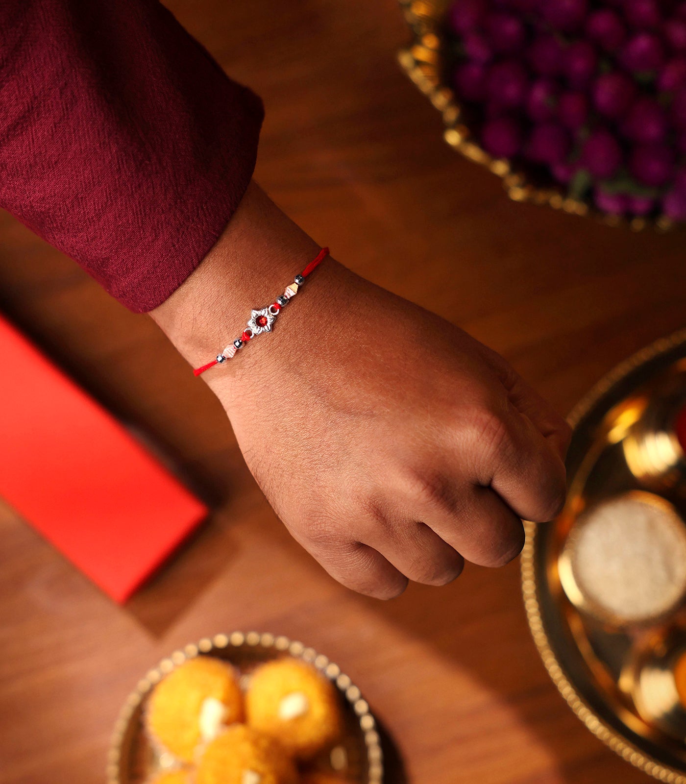 Beautiful Silver Rakhi - Red Stone Delicate floral Design