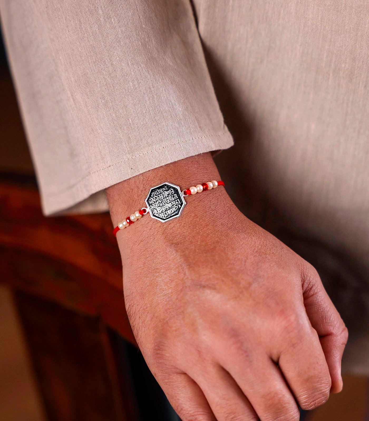 Beautiful Silver Rakhi - The Shivmudra Text Design