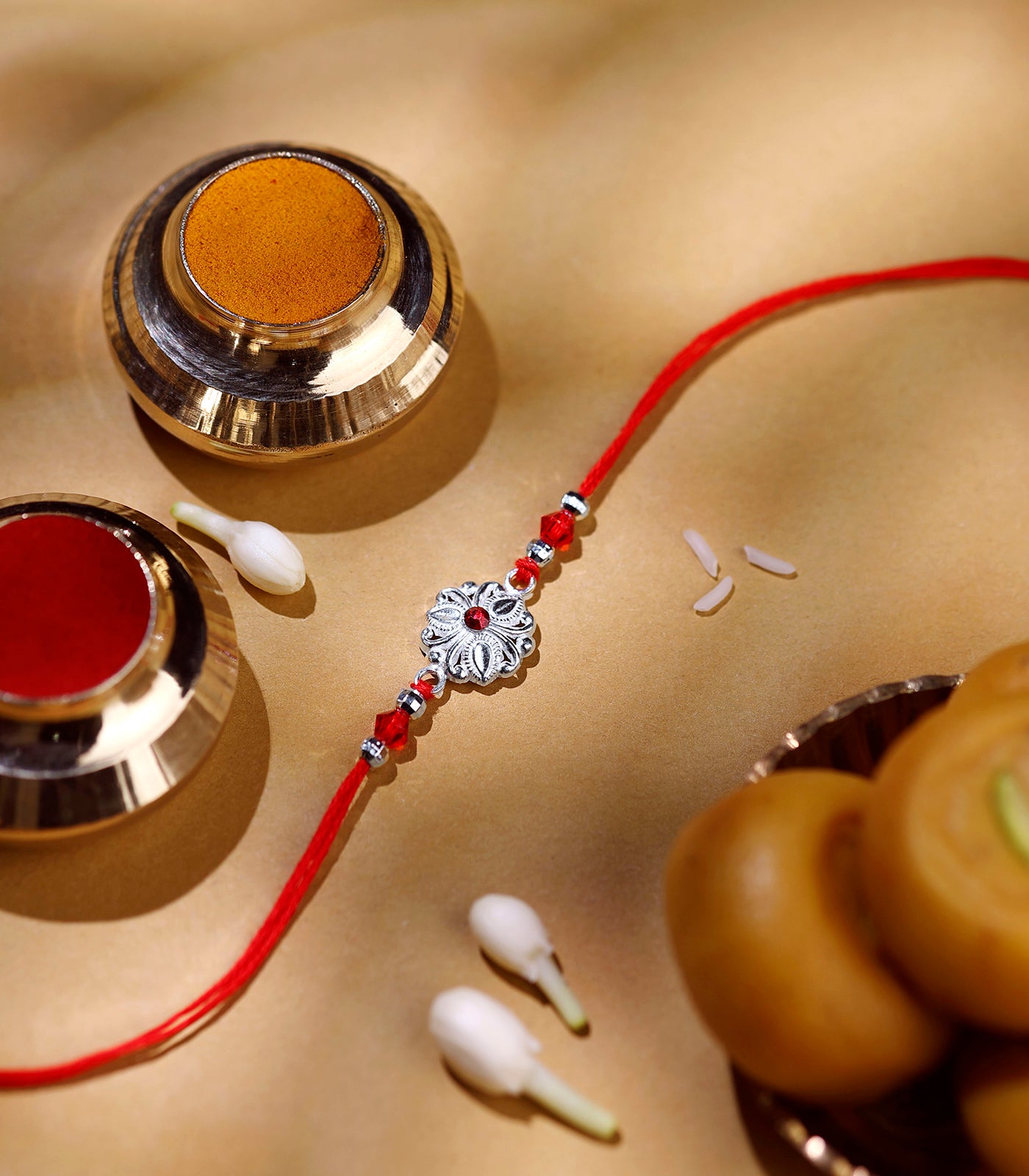 Beautiful Silver Rakhi - Delicate Tri-petal design