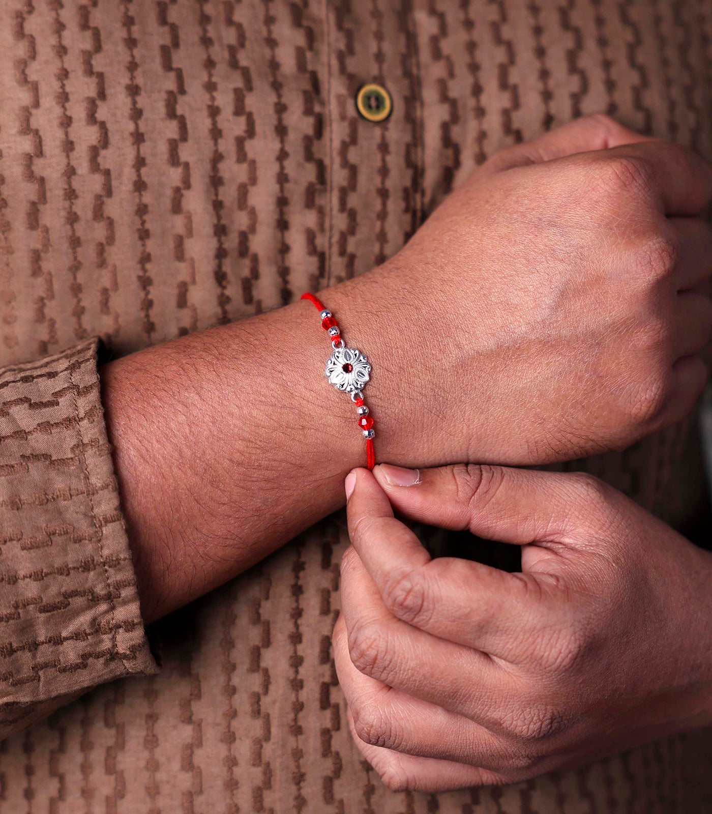Beautiful Silver Rakhi - Delicate Tri-petal design