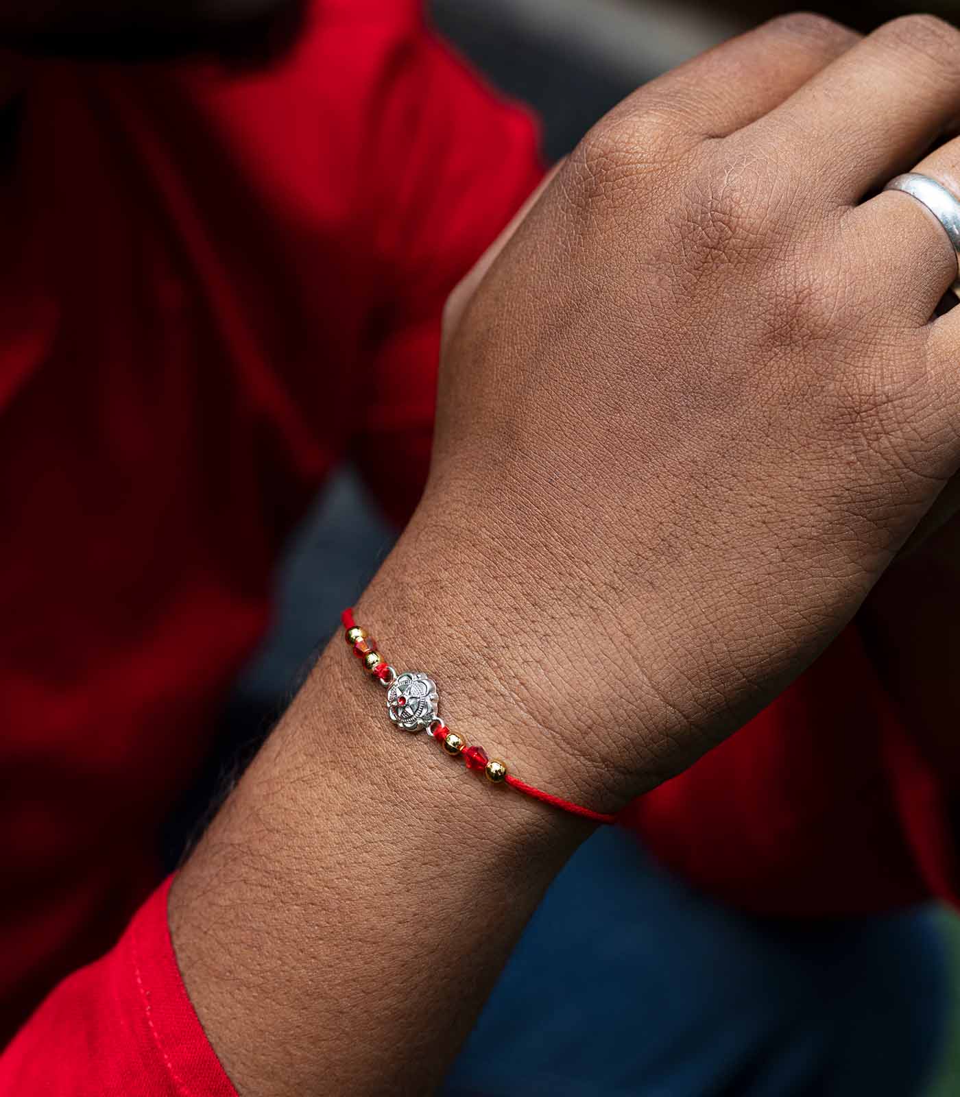 Stunning Silver Rakhi - The Elegant Star Design