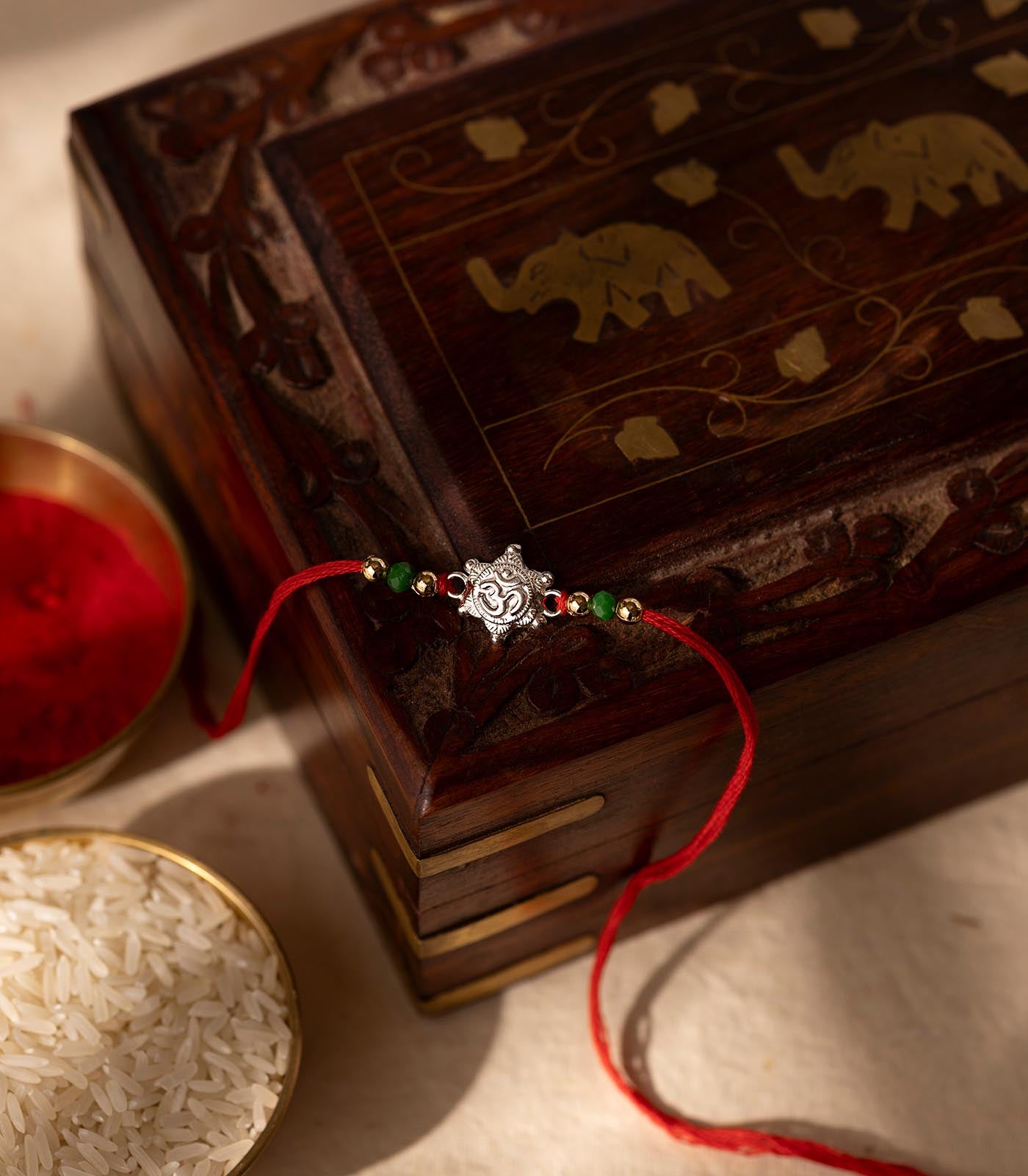 Stunning Silver Rakhi - OM Engraved Star Design