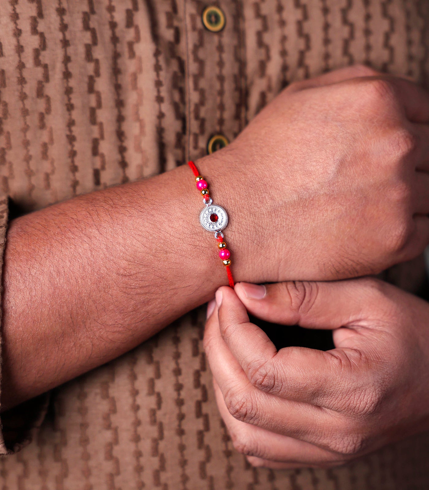 Stunning Silver Rakhi - The Elegant Chakra Design