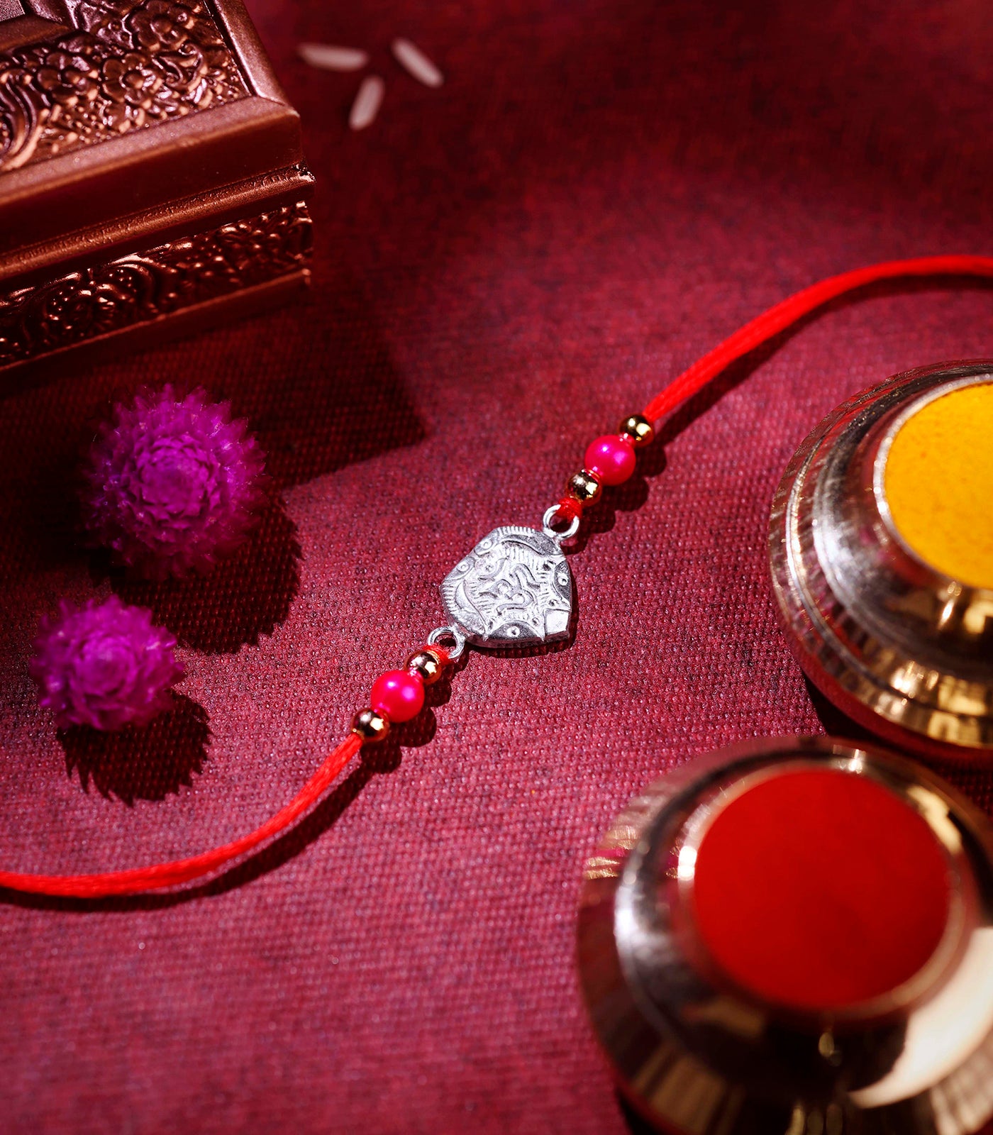 Stunning Silver Rakhi - OM Engraved Heart Design