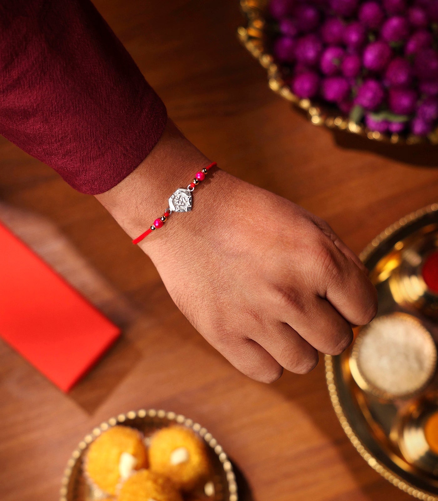 Stunning Silver Rakhi - OM Engraved Heart Design