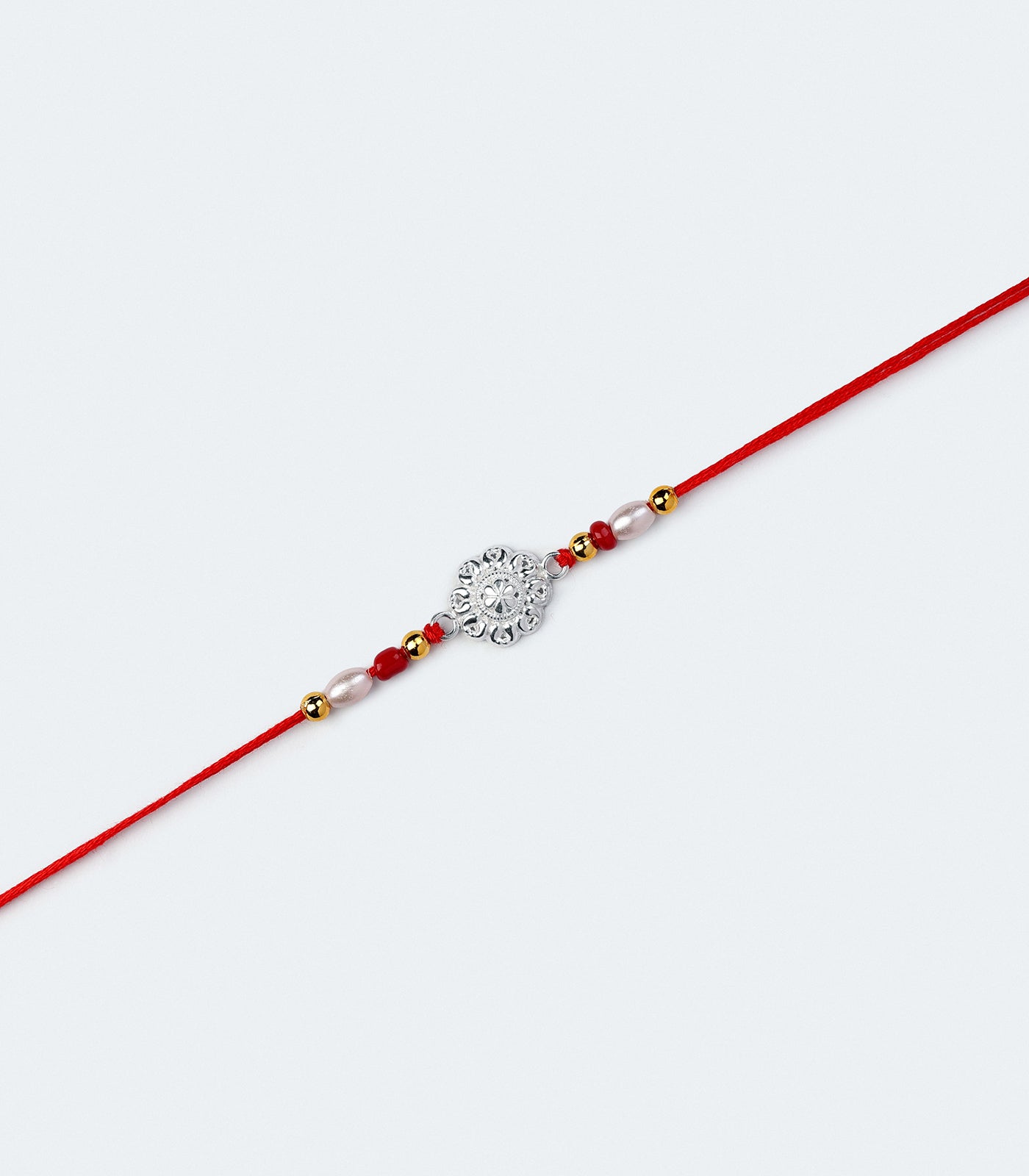 Beautiful Silver Rakhi - Small Flower Design