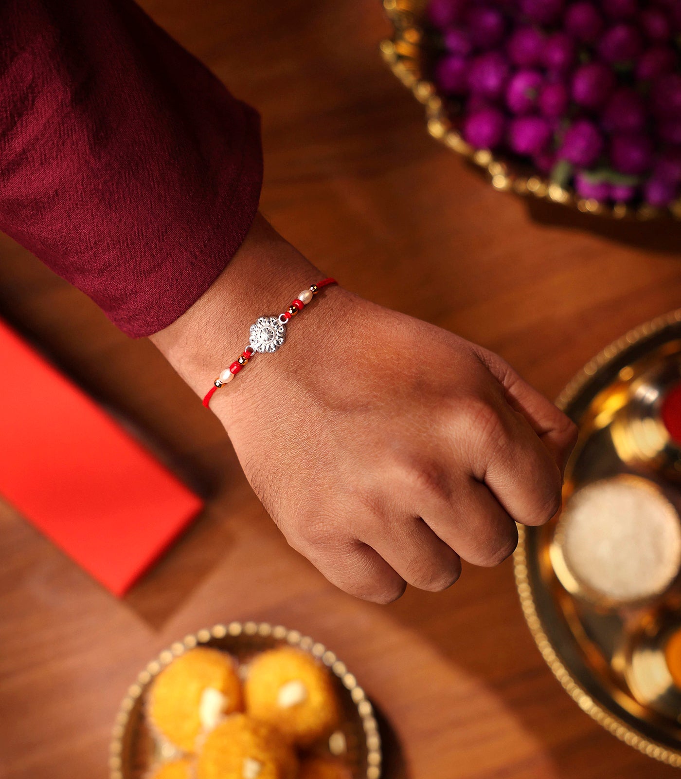 Beautiful Silver Rakhi - Small Flower Design