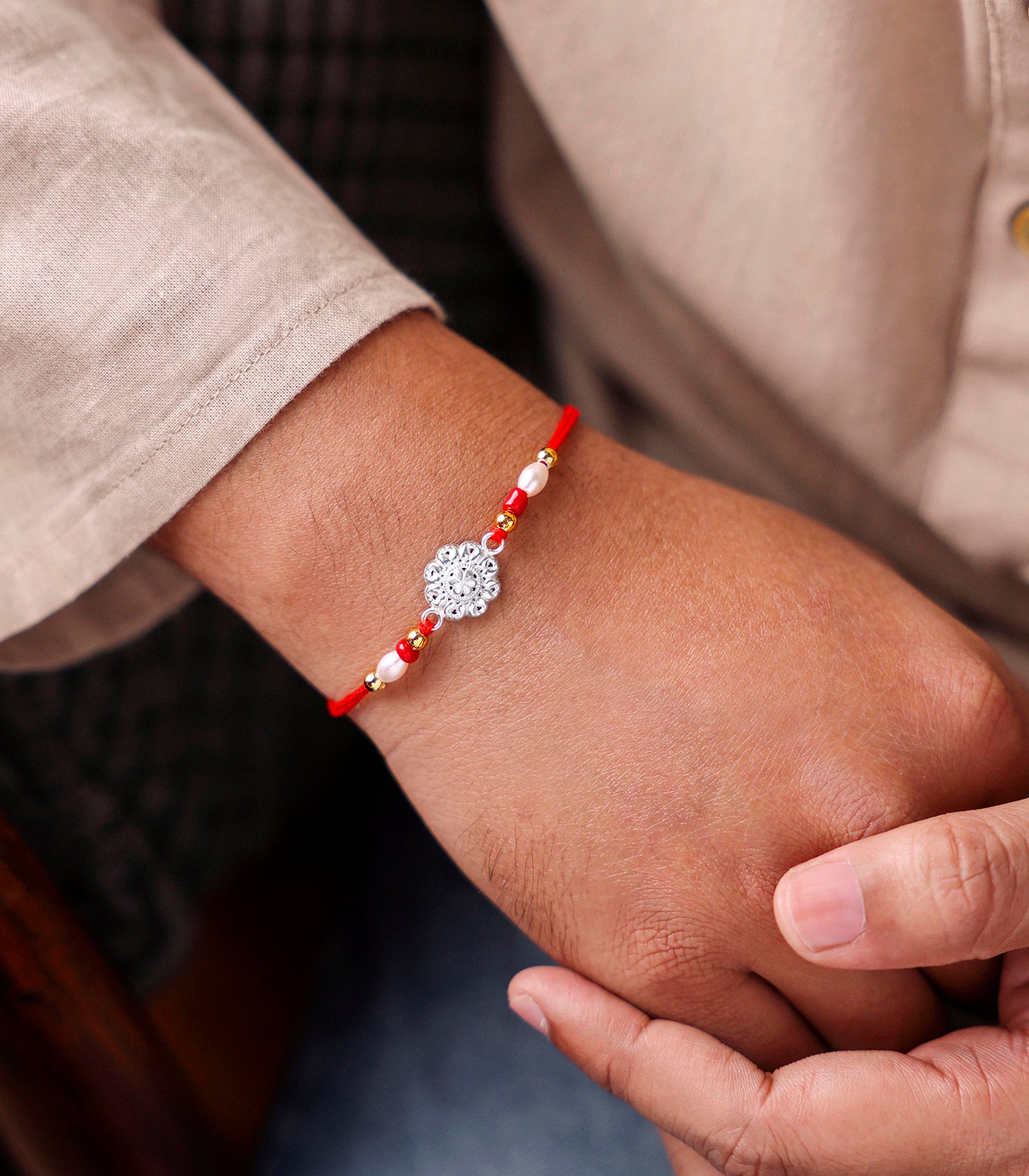 Beautiful Silver Rakhi - Small Flower Design