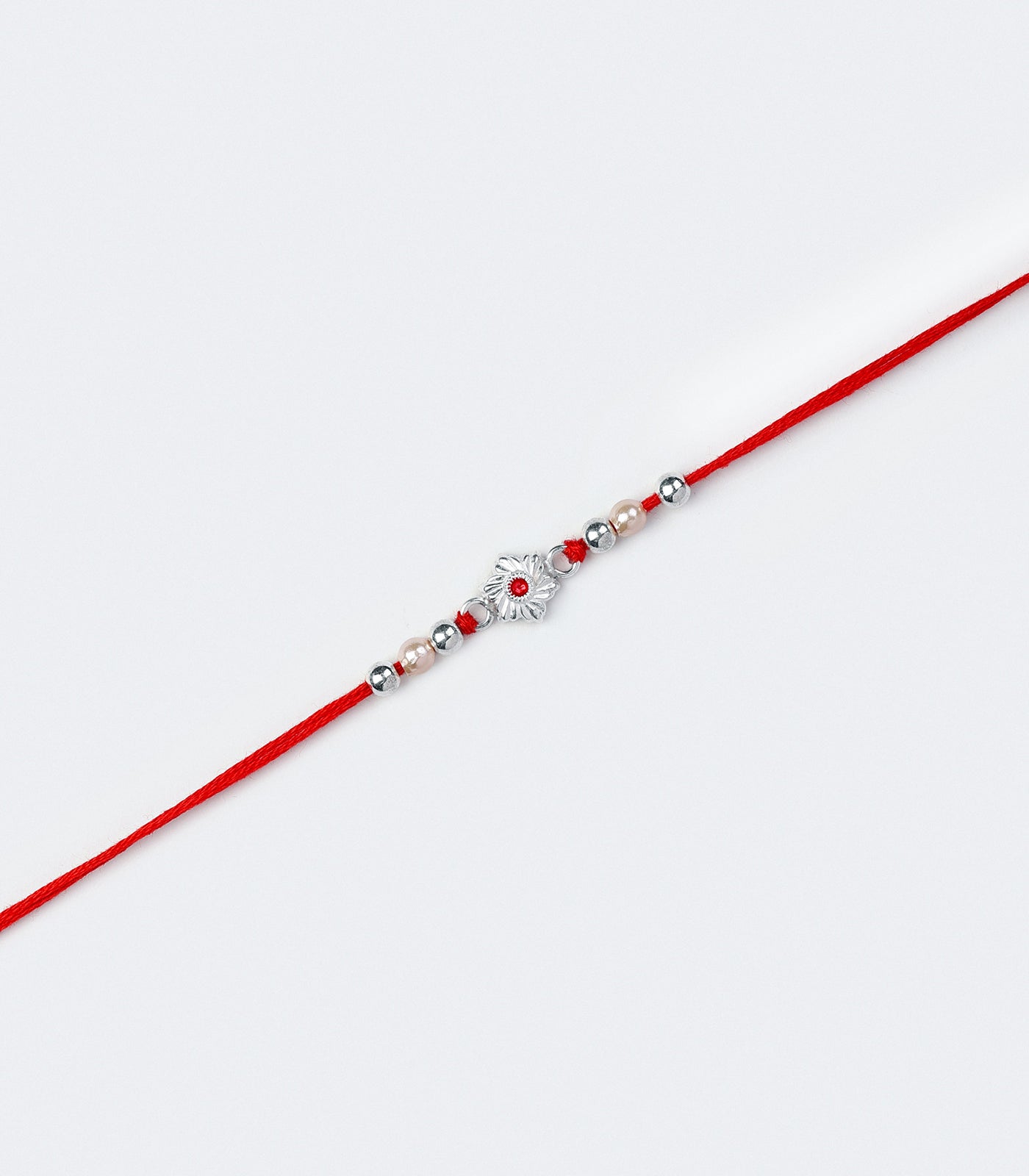 Beautiful Silver Rakhi - Elegant Floral Design