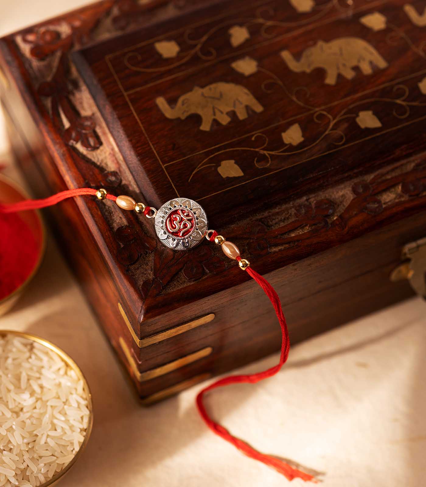Stunning Silver Rakhi - OM Engraved Circular Design