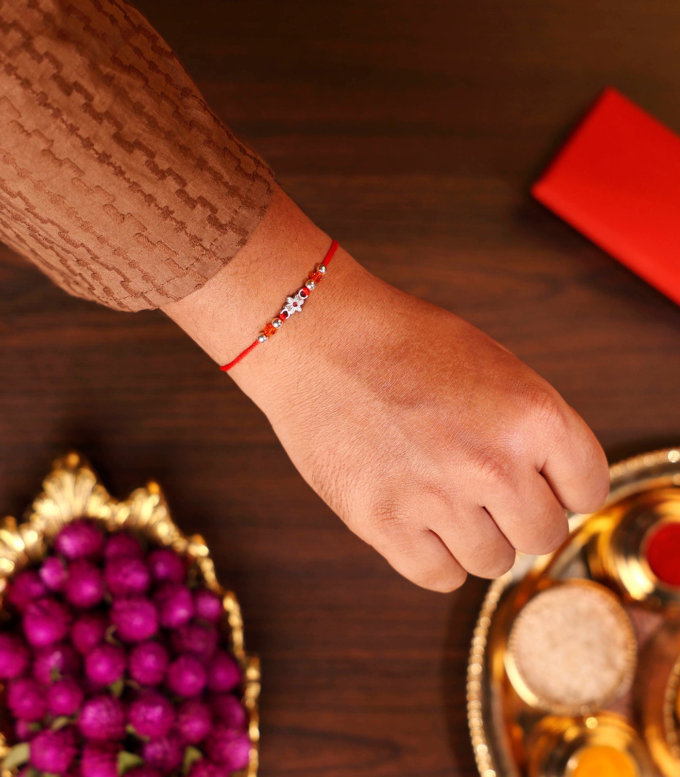 Stunning Silver Rakhi - The Elegant Floral Design