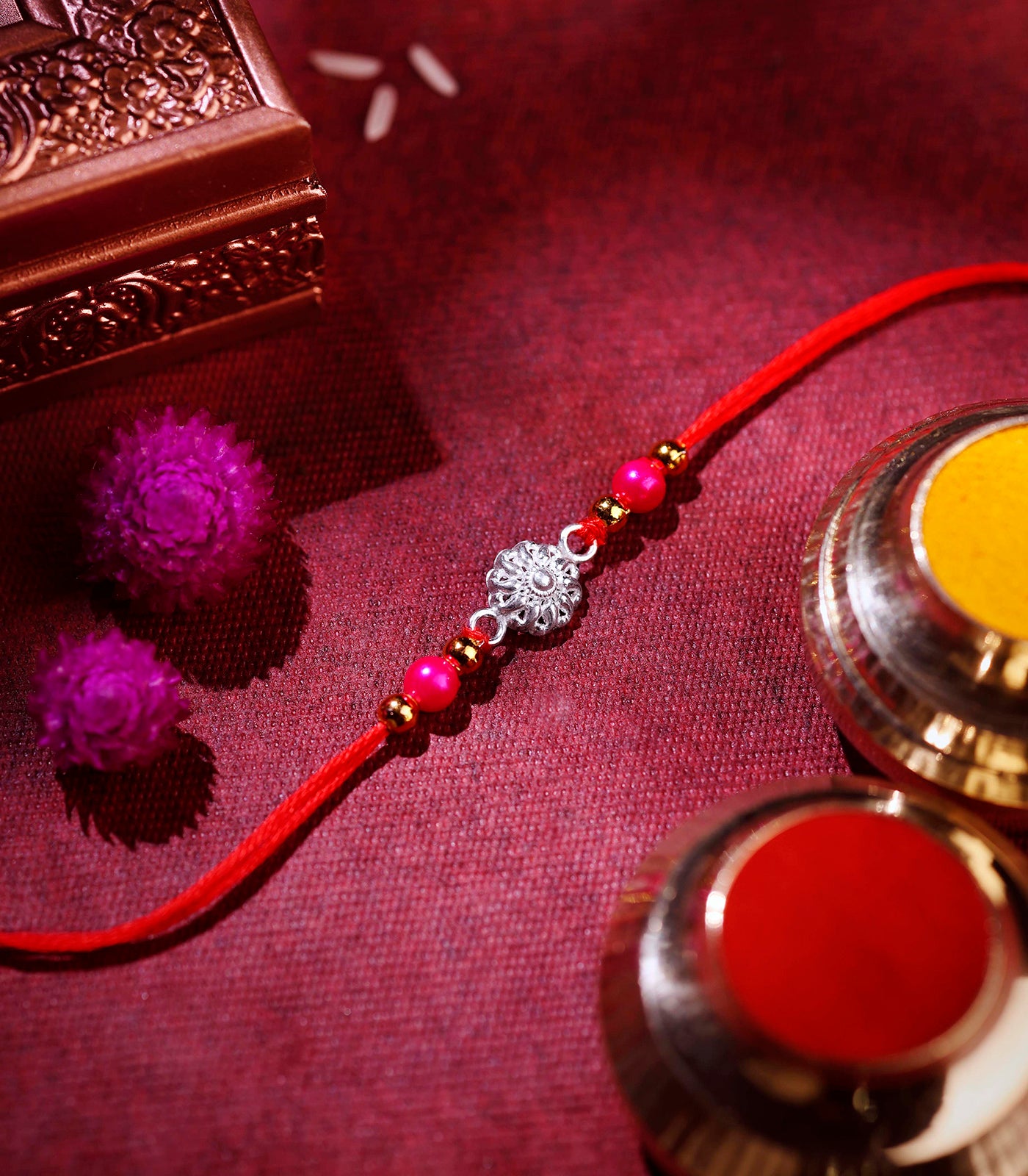 Silver Rakhi - The delicate petal motif design