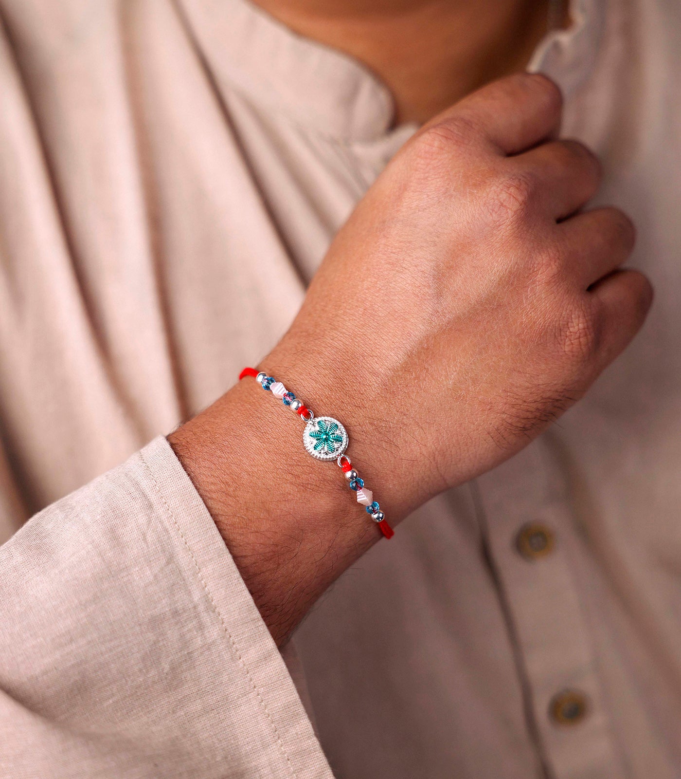 Teal Floral Silver Rakhi
