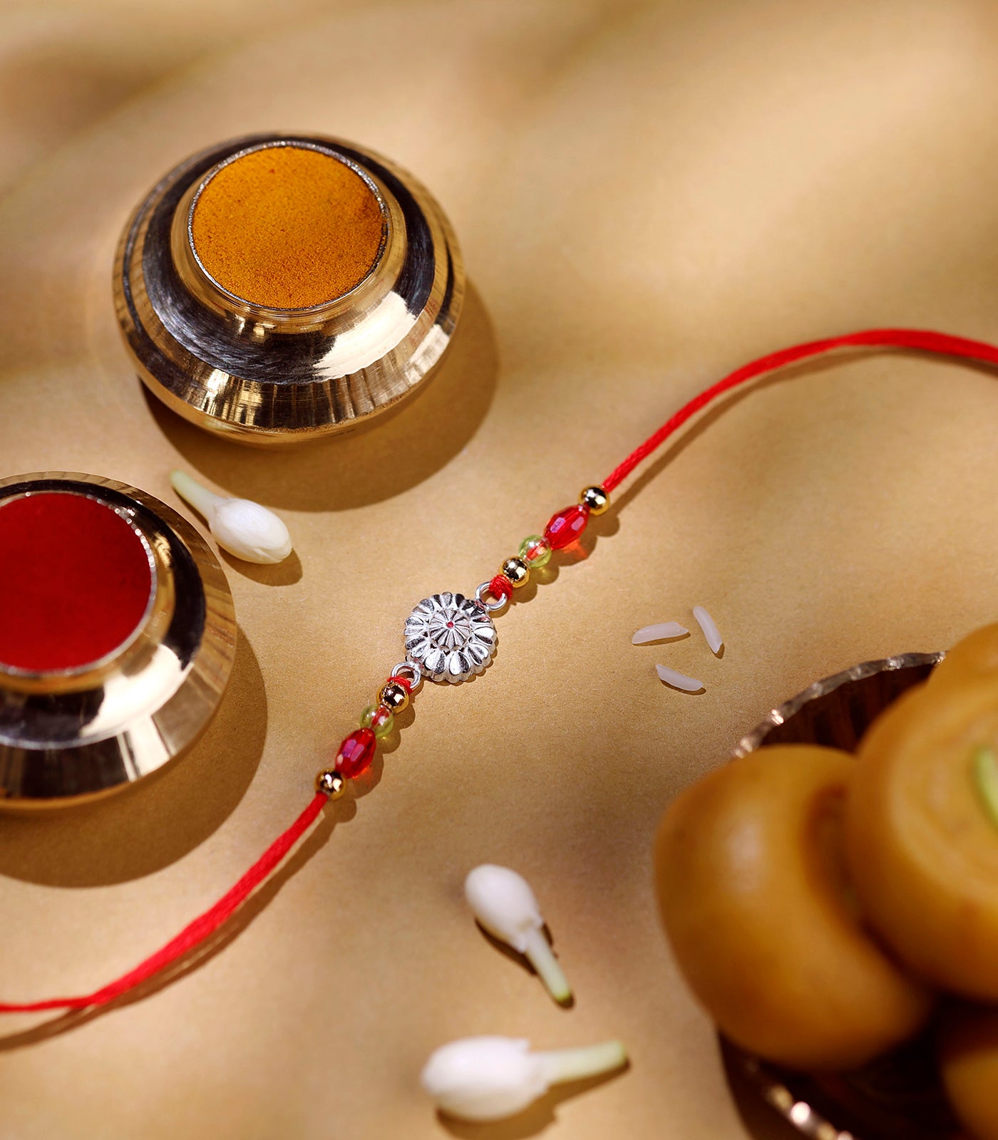 Elegant Petal Motif Silver Rakhi