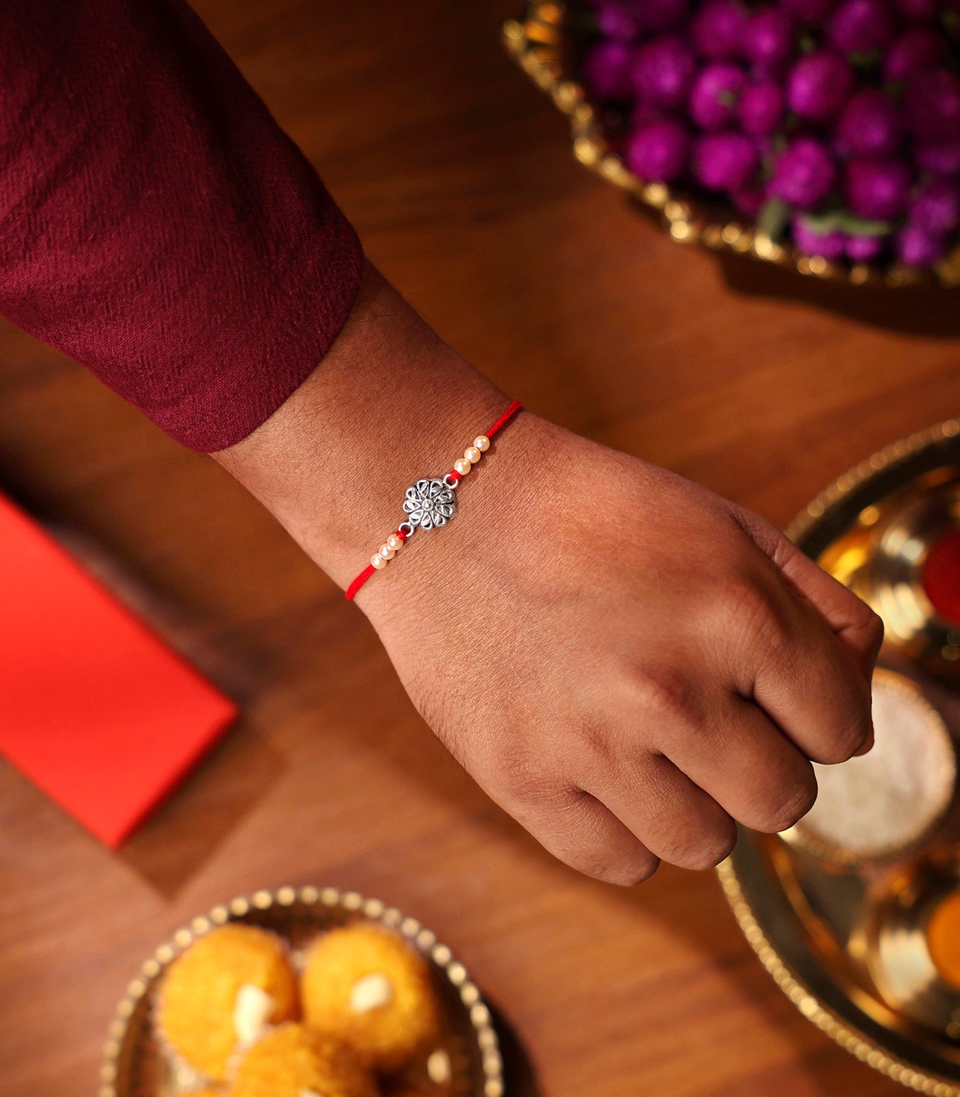 Petal And Leaf Motif Silver Rakhi