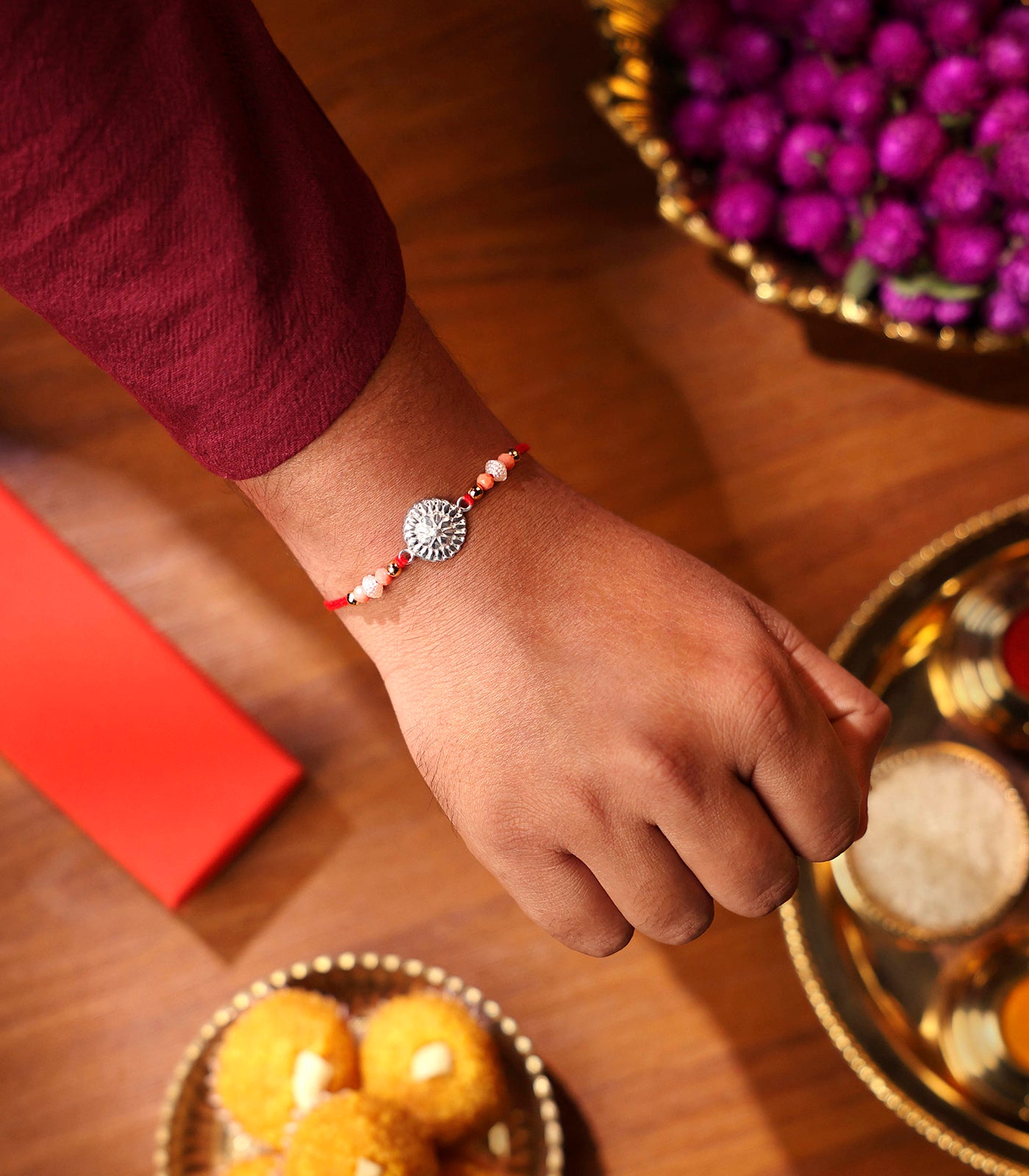 Silver Floral Wheel Rakhi
