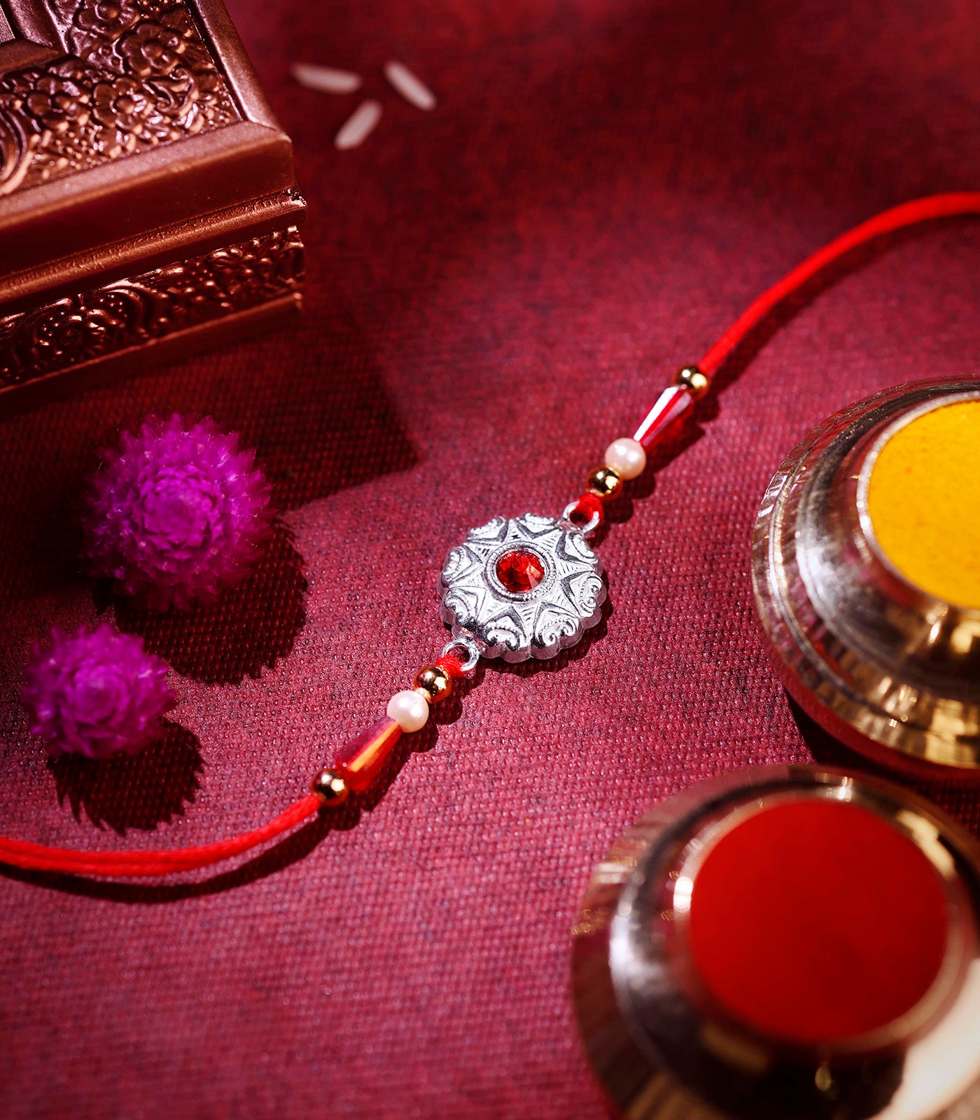 Silver Star Shaped Red Stone Rakhi