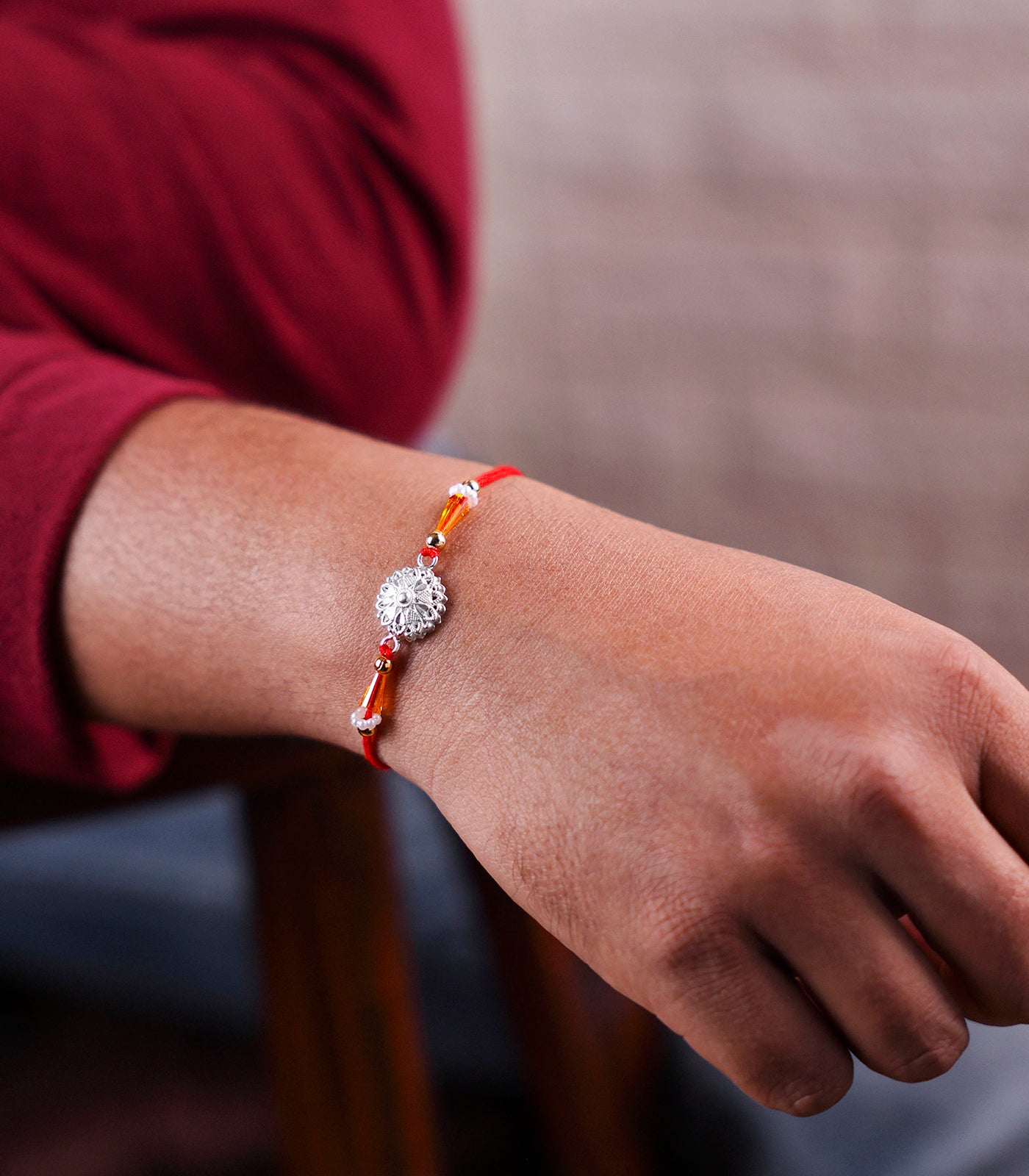 Silver Heart Shaped Petal Motif Rakhi