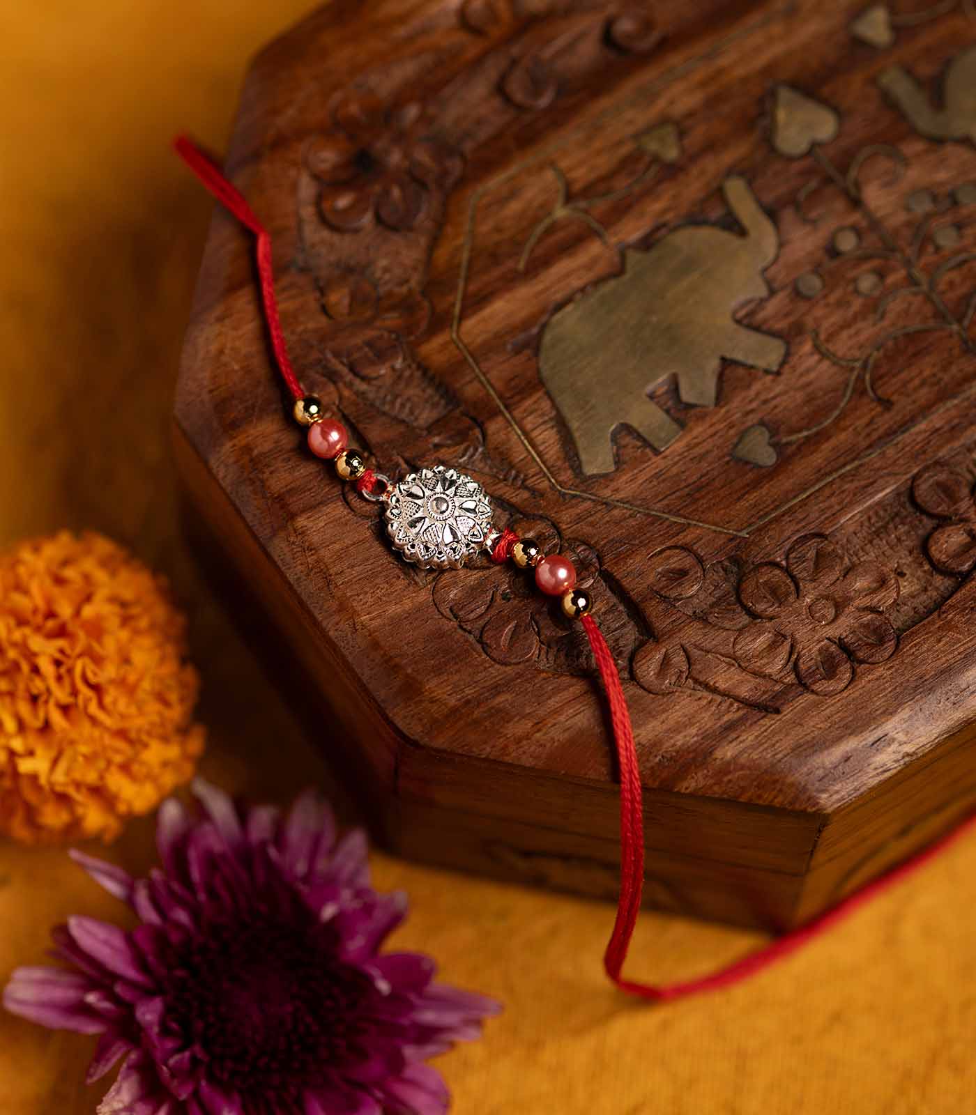 Silver Heart Shaped Petal Motif Rakhi