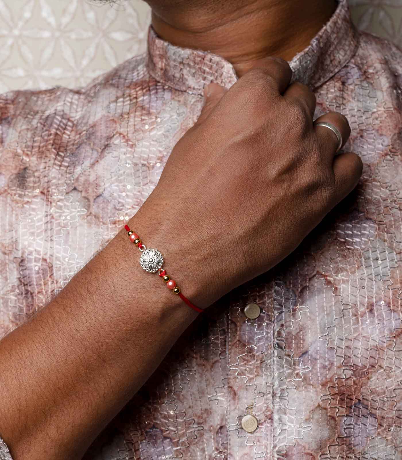 Silver Heart Shaped Petal Motif Rakhi