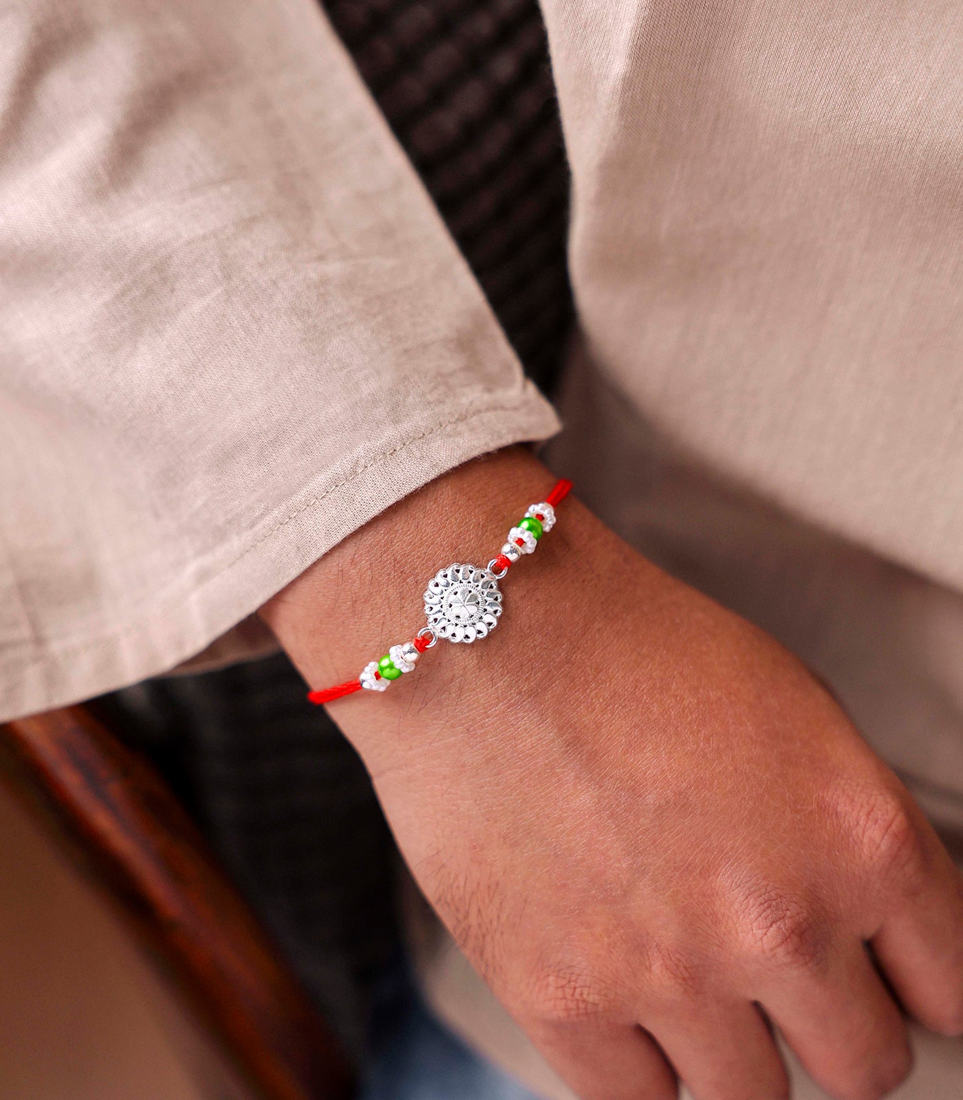 Silver Intricate Flower Rakhi