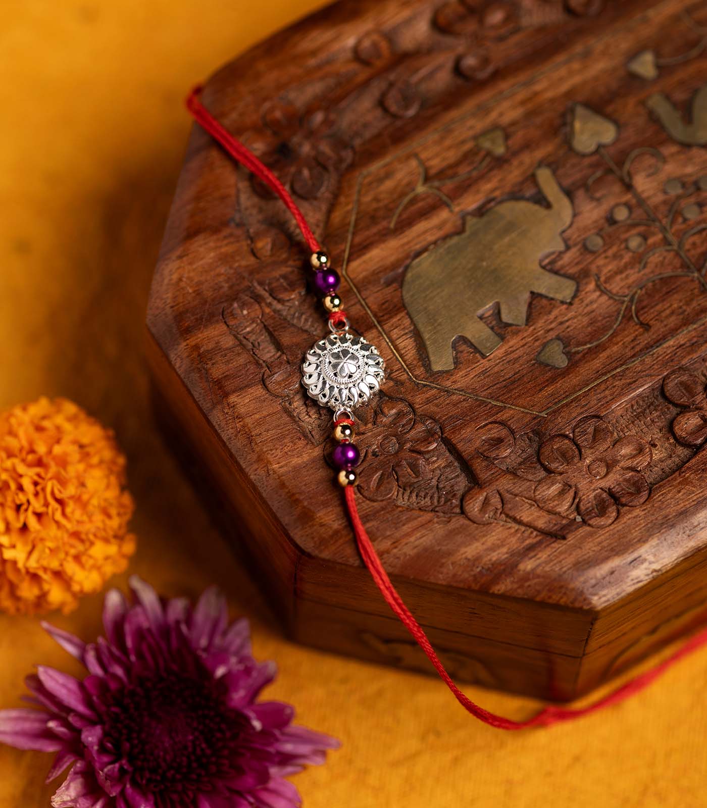 Silver Intricate Flower Rakhi