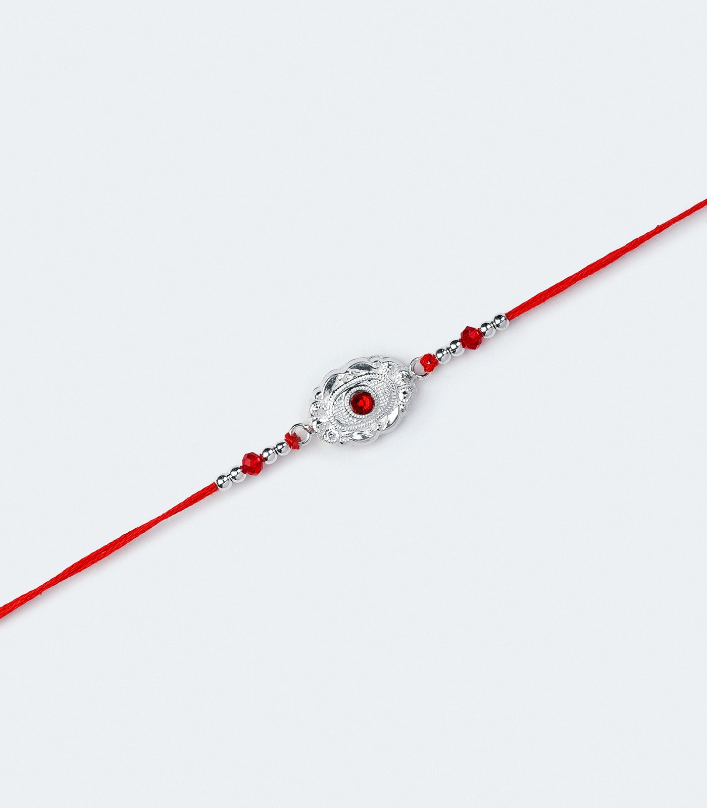 Silver Red Stone Oval Shaped Rakhi