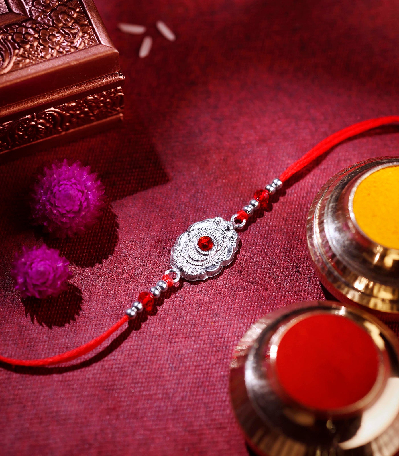 Silver Red Stone Oval Shaped Rakhi