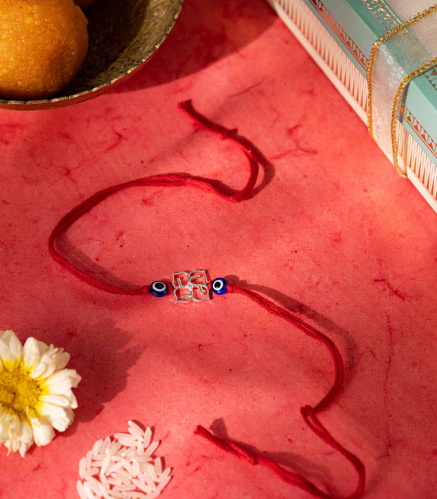 Silver Swastik Evil Eye Rakhi