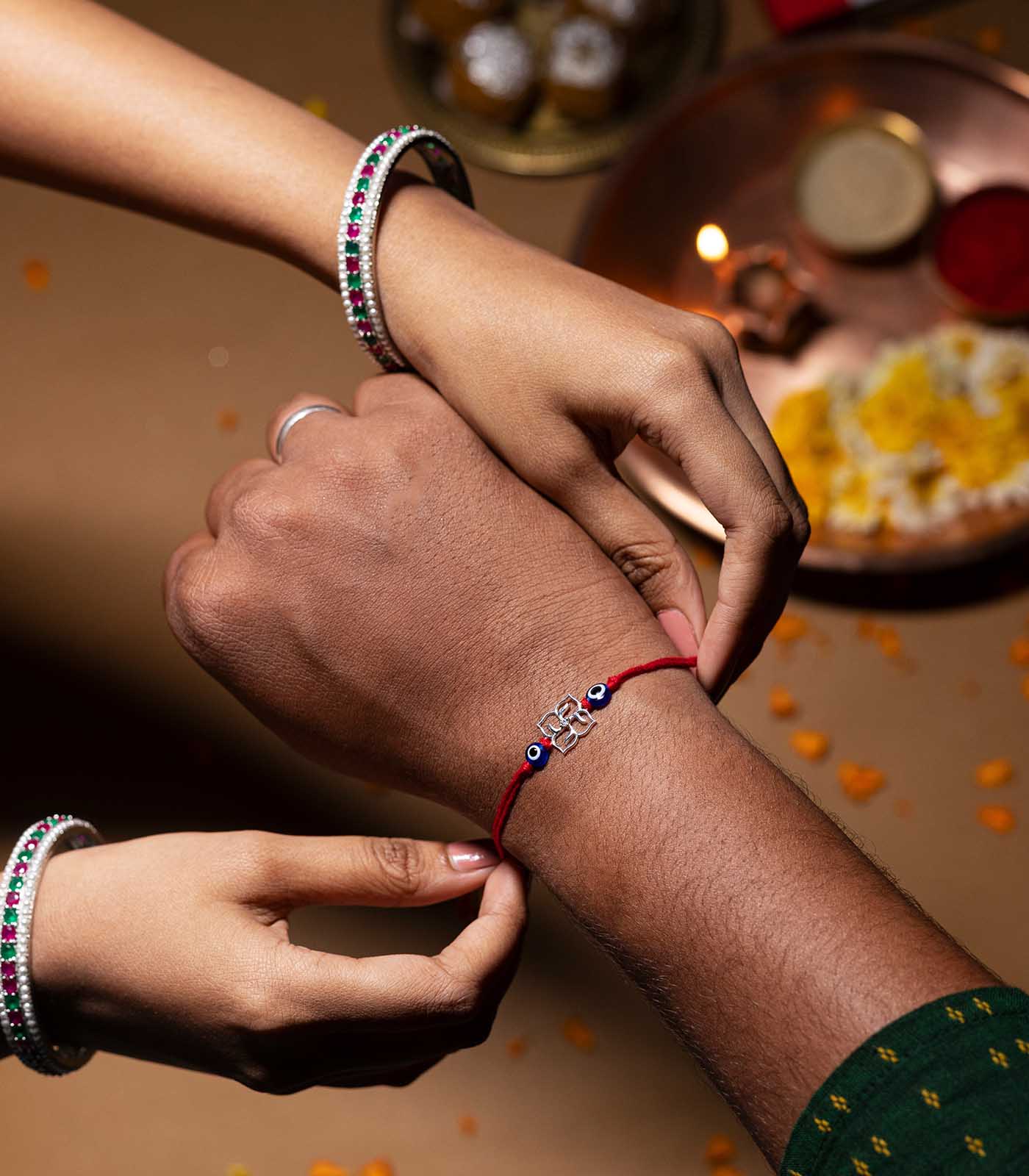 Silver Swastik Evil Eye Rakhi