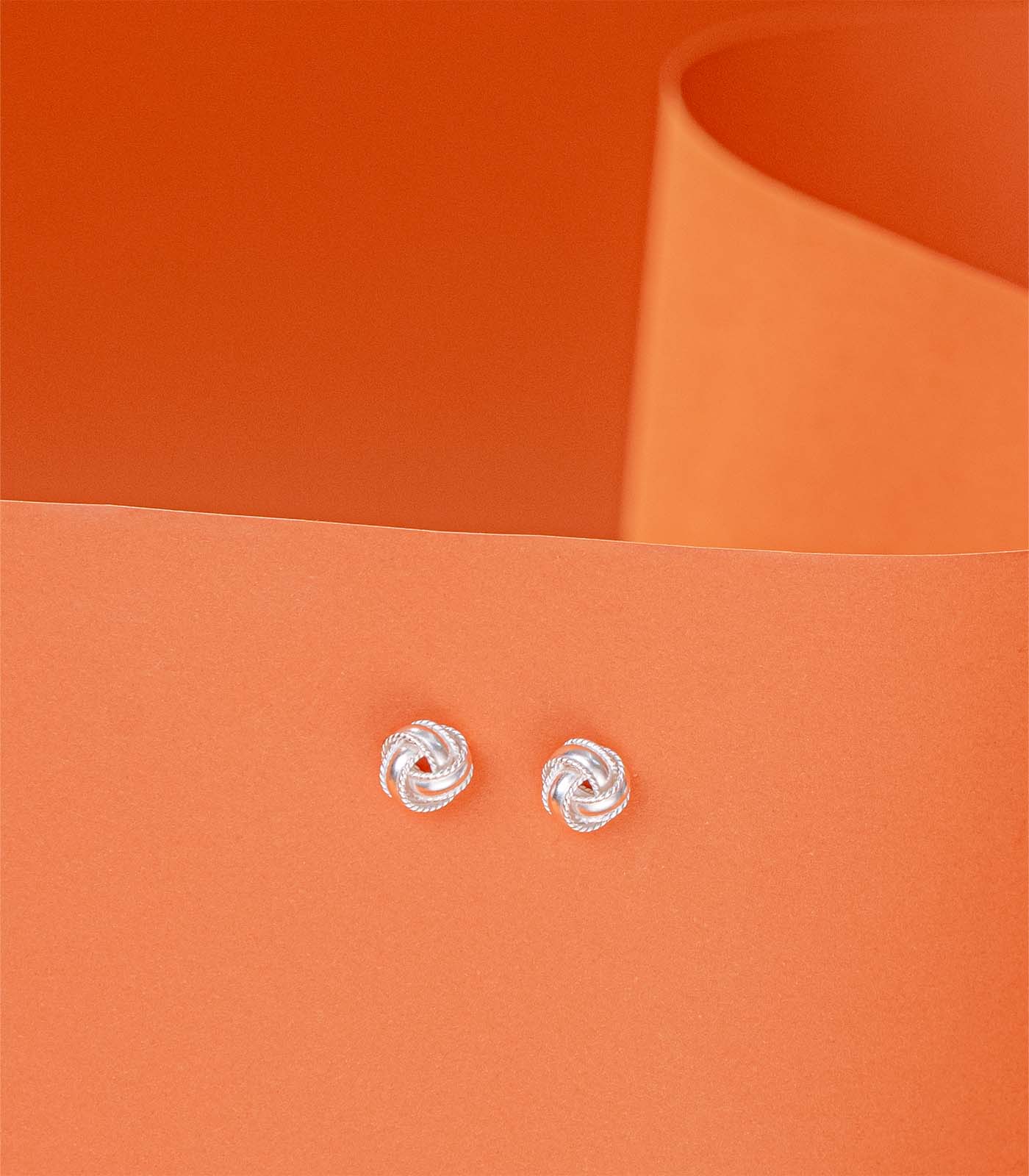 Interlocked Round Orbits Dual Silver Tops