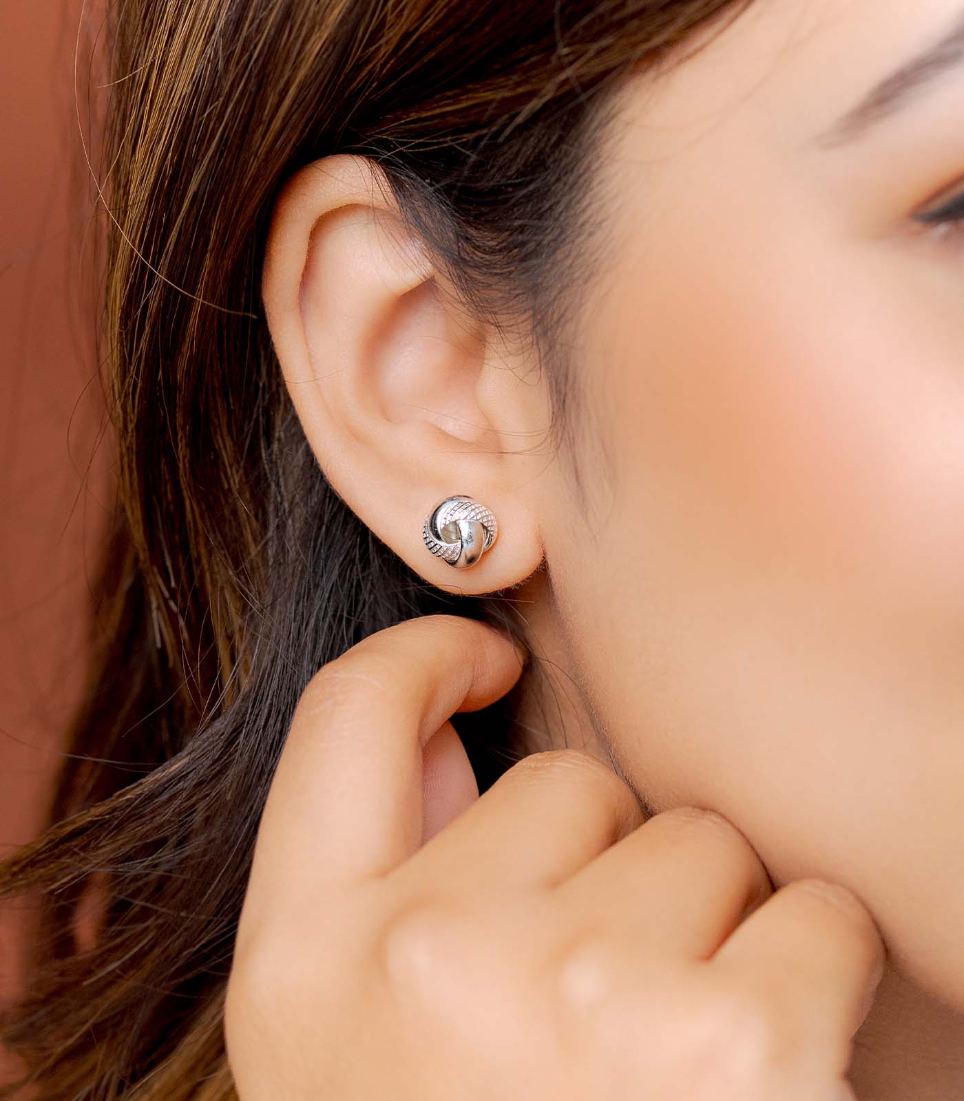 Interlocked Round Orbits Dual Textured Silver Tops