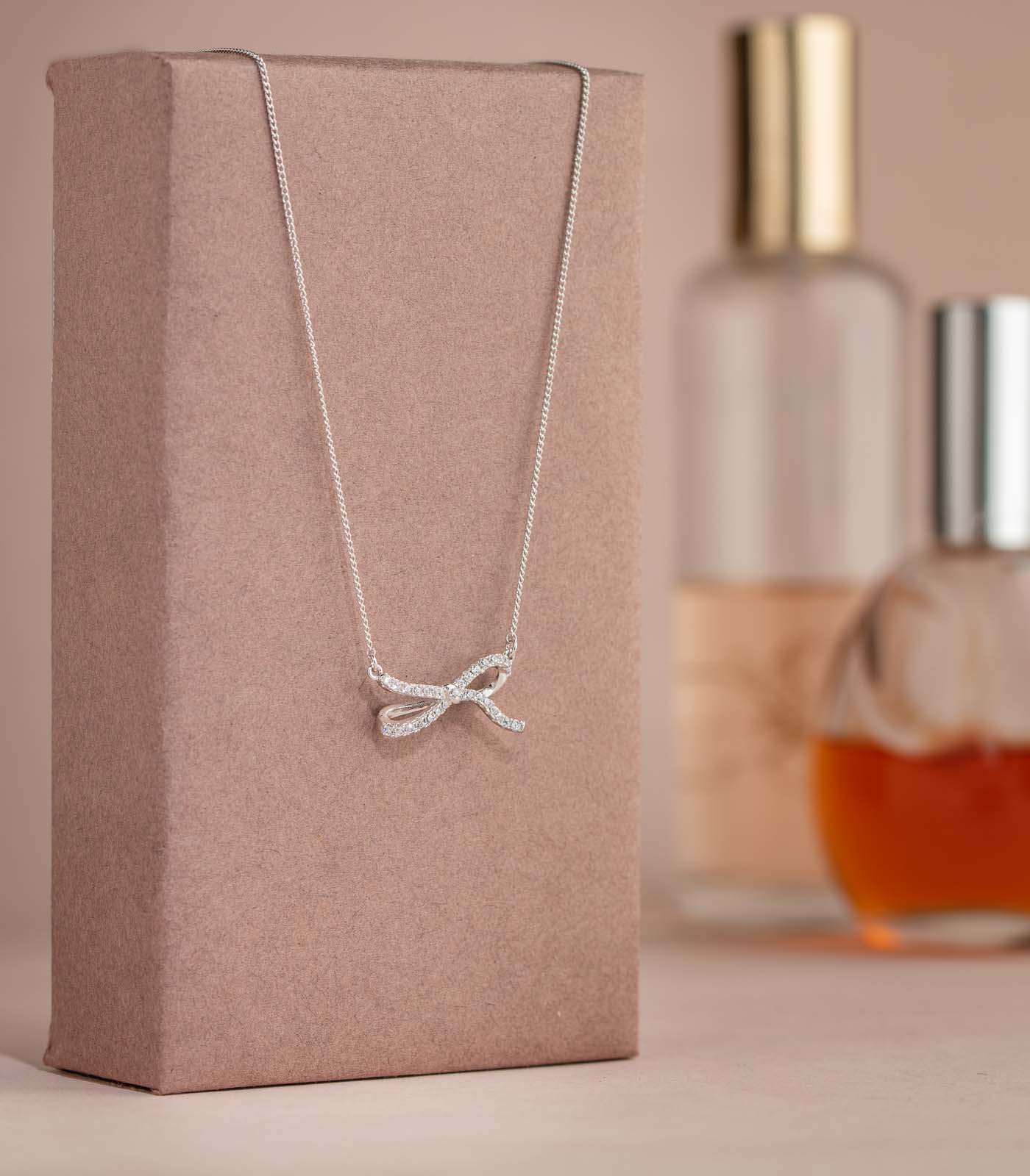 Bedazzled Bowknots SIlver Color Pendant (Brass)