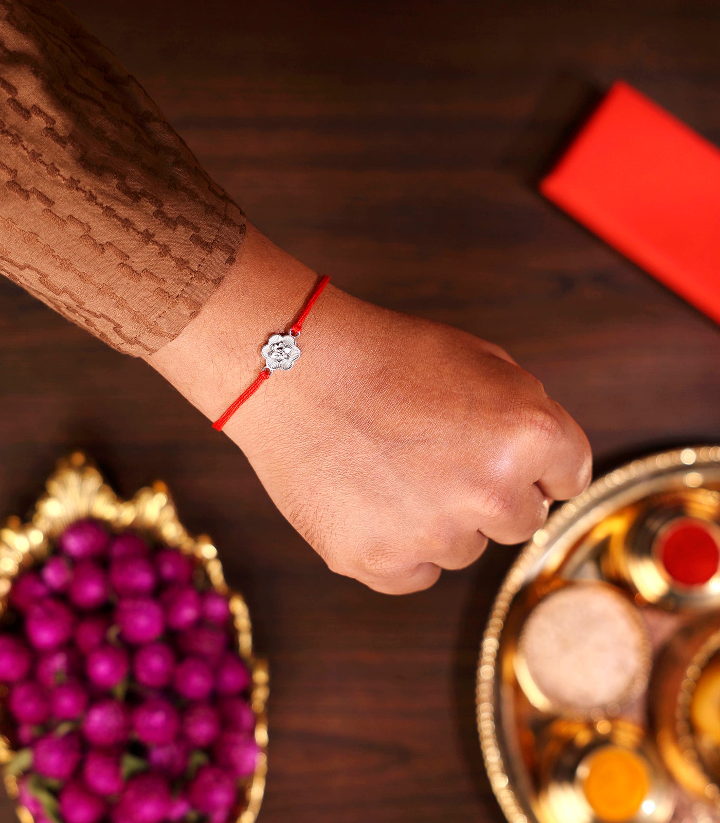 Dainty Floral Motif Silver Rakhi