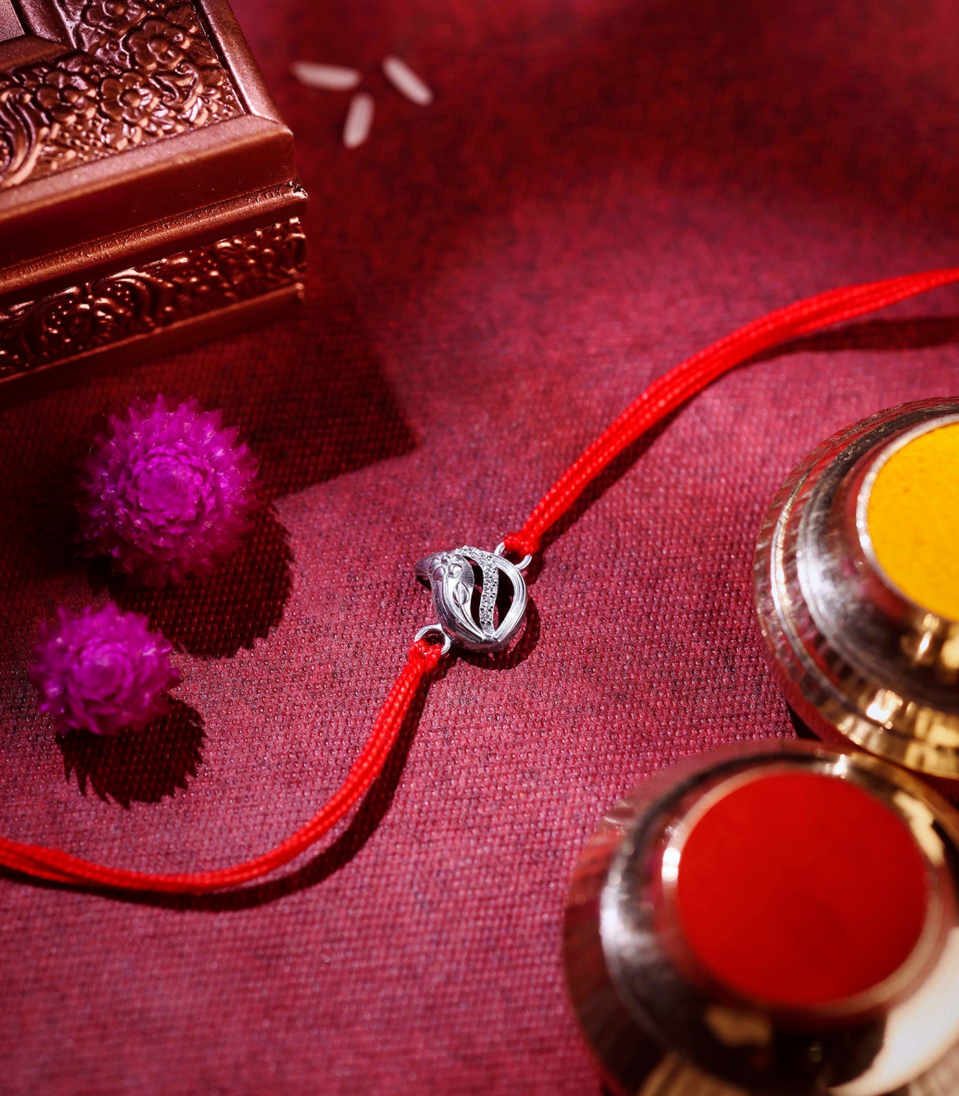 Shining Stone-studded Silver Rakhi